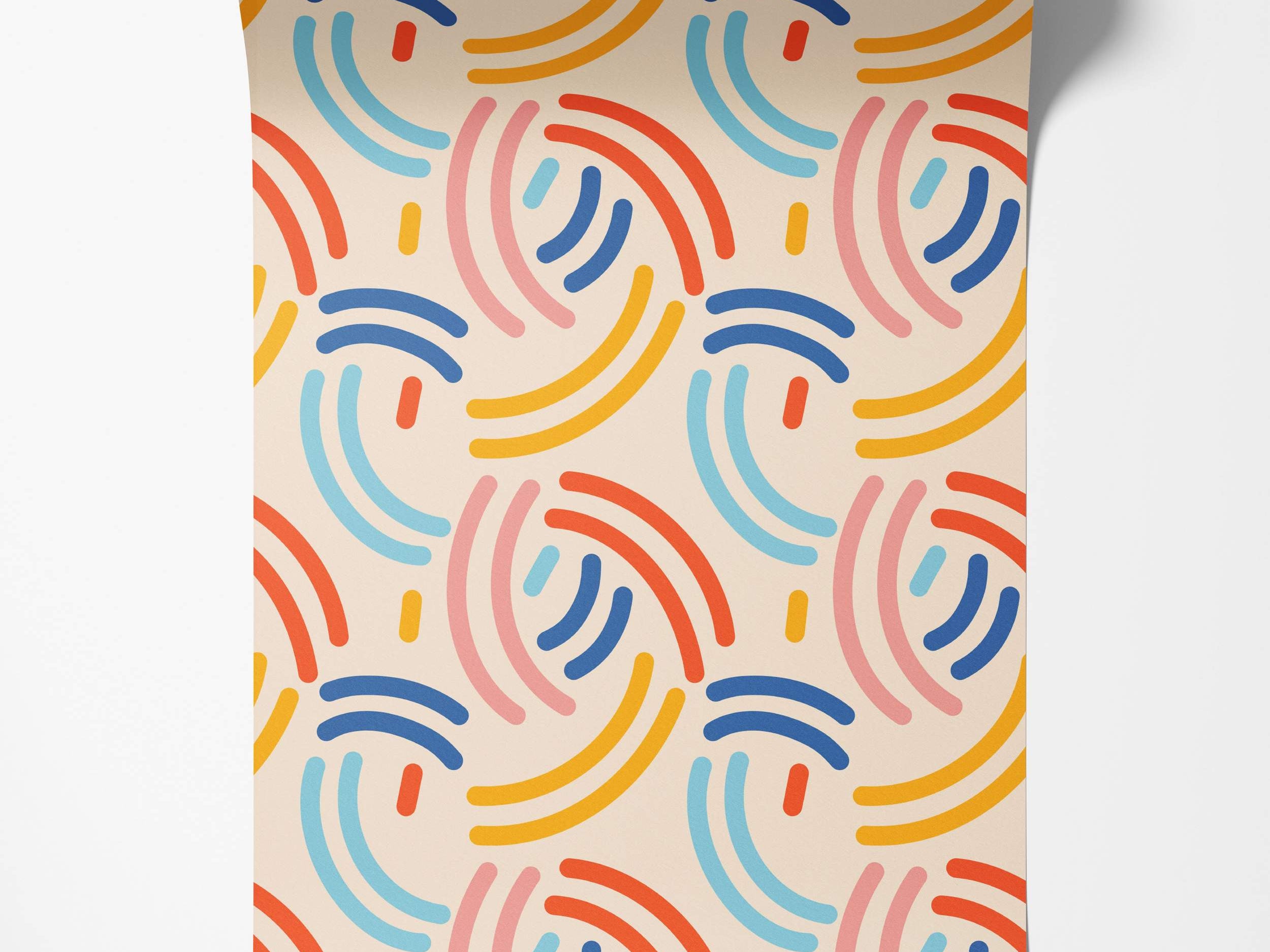 Wallpaper featuring a playful abstract pattern of repeating curved arches in red, blue, yellow, pink, and light blue.