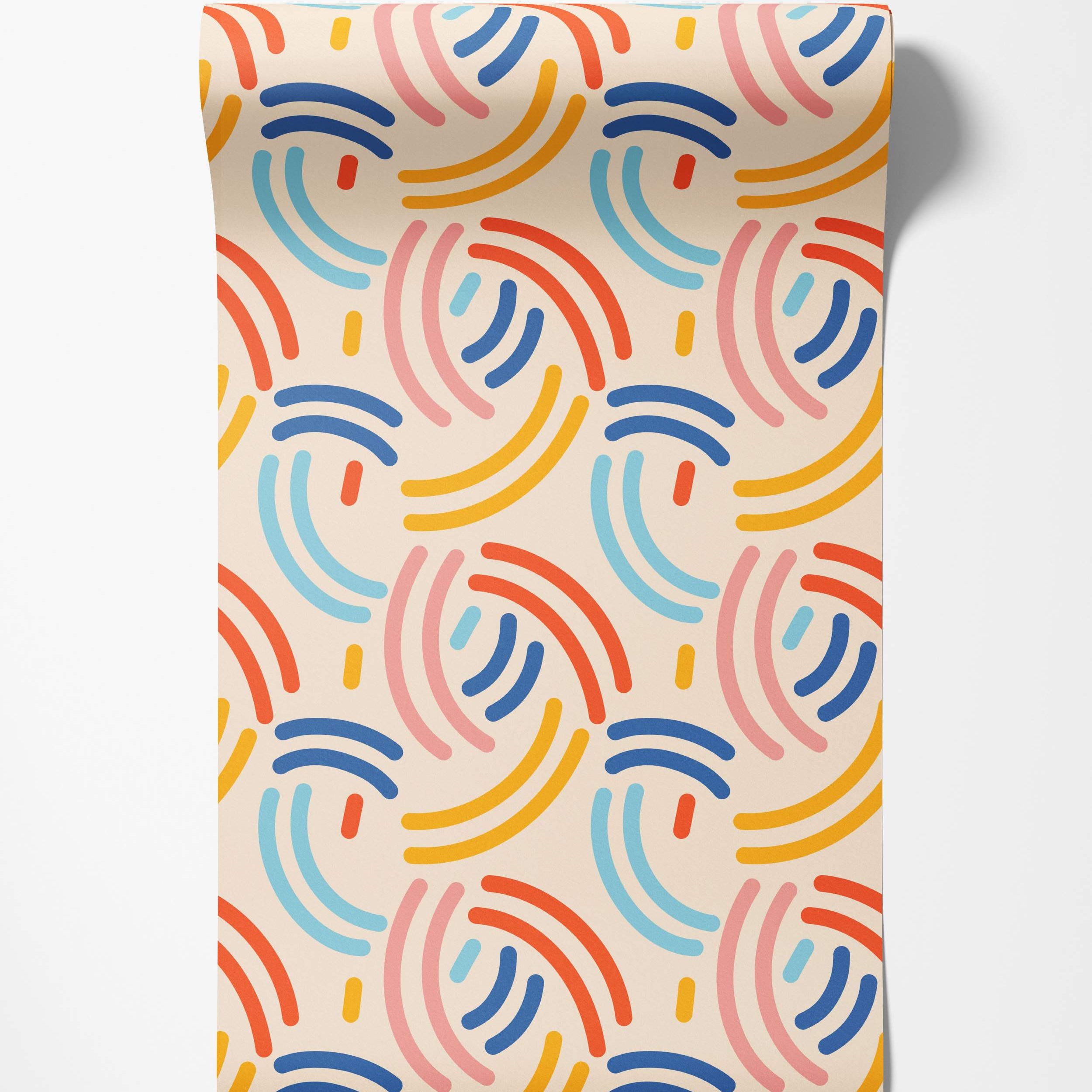 Wallpaper featuring a playful abstract pattern of repeating curved arches in red, blue, yellow, pink, and light blue.