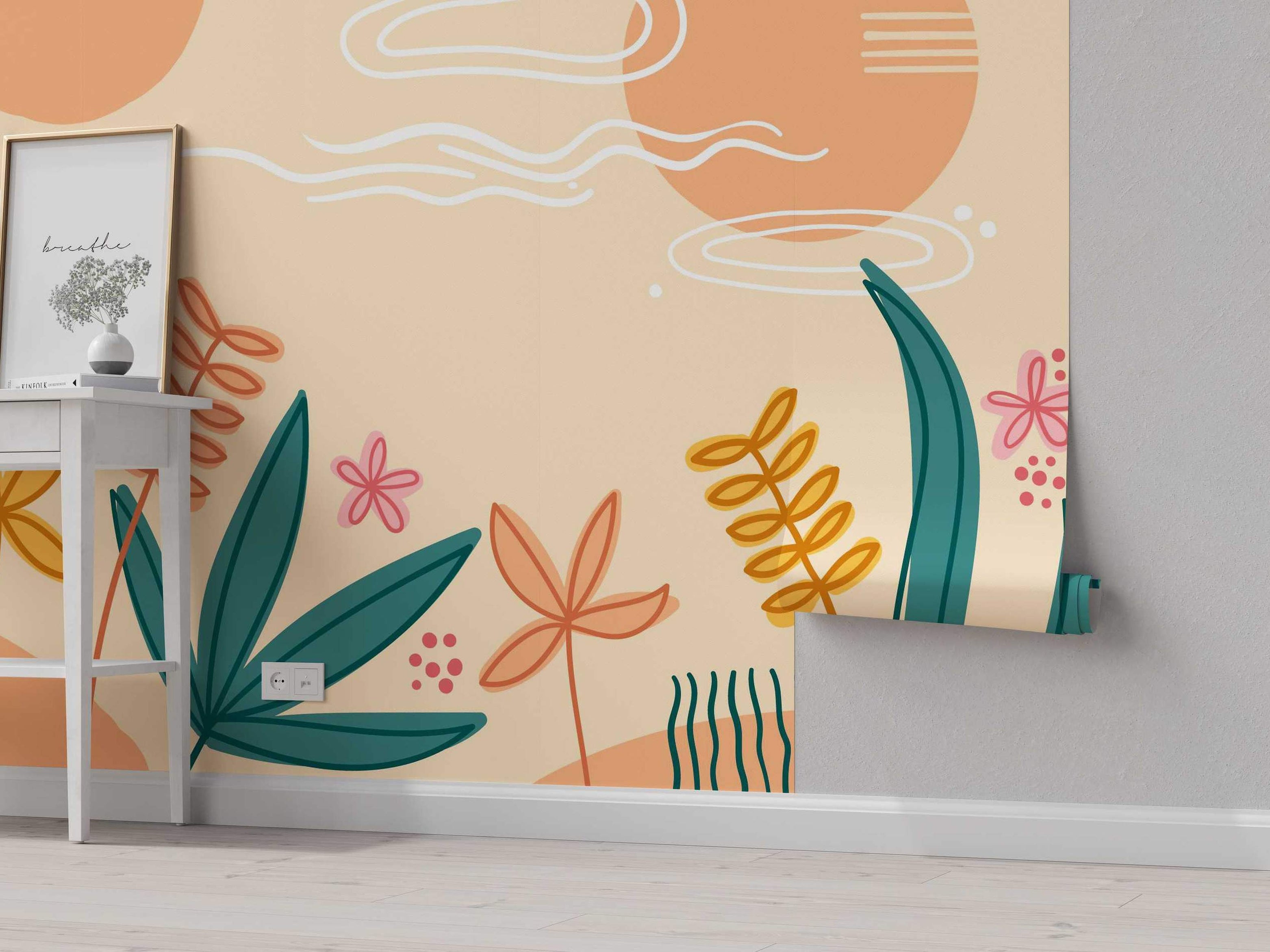 Abstract botanical mural featuring large teal leaves, peach and yellow foliage, pink flowers, and sun elements on a beige backdrop.