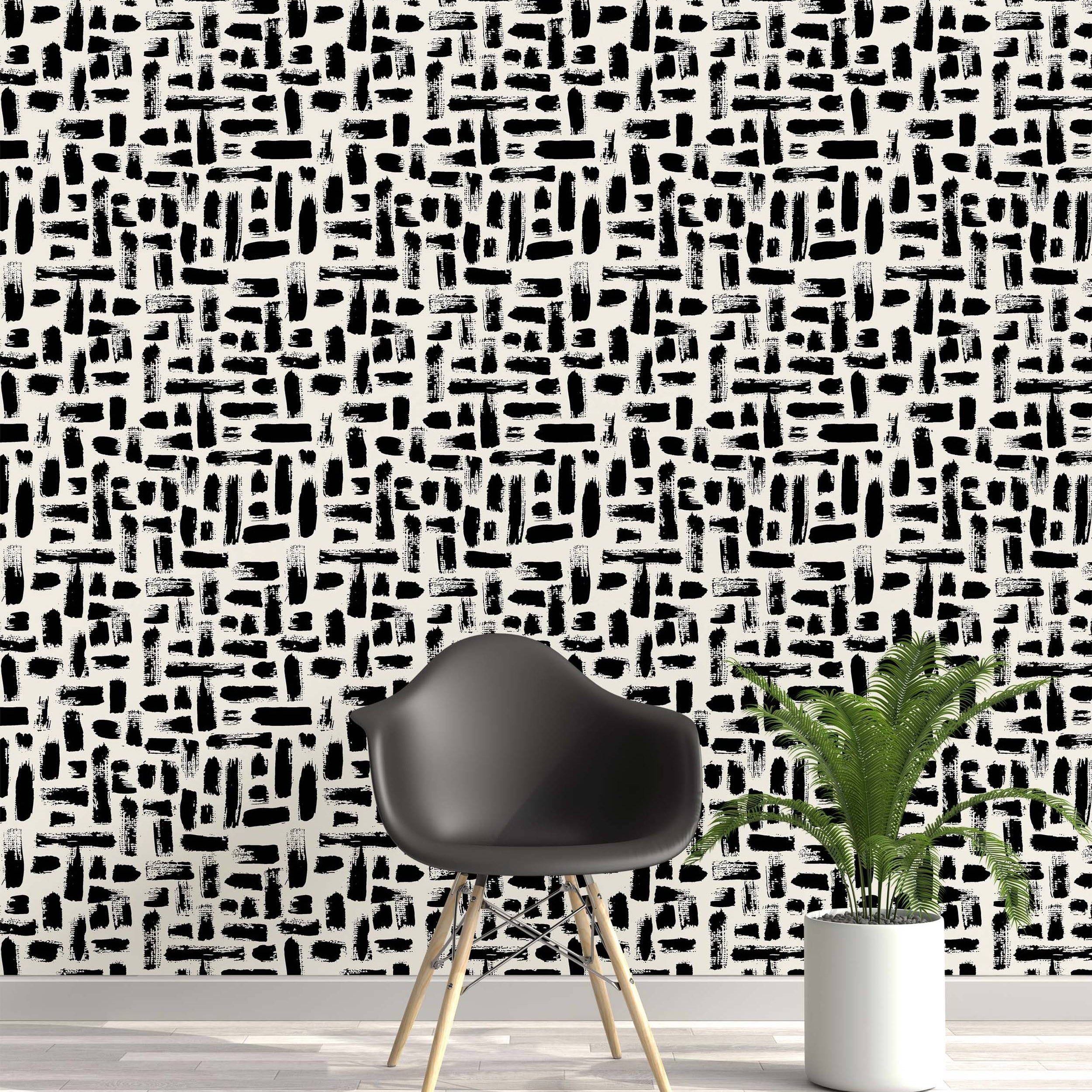Abstract wallpaper featuring rough, textured black brush strokes scattered horizontally and vertically on an off-white background.