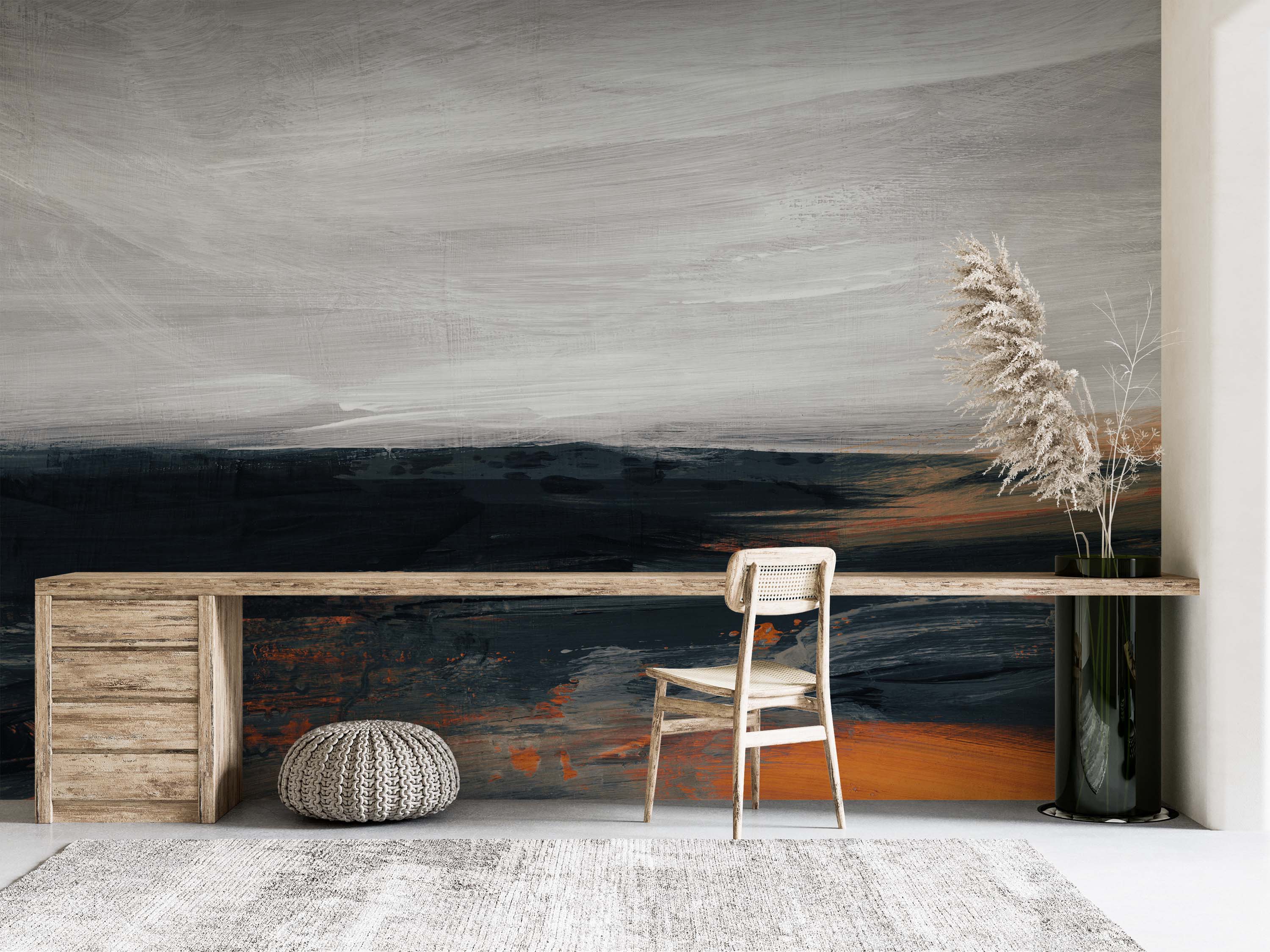 Abstract mural with broad, horizontal brushstrokes in shades of gray, black, and vibrant orange, resembling a moody landscape.