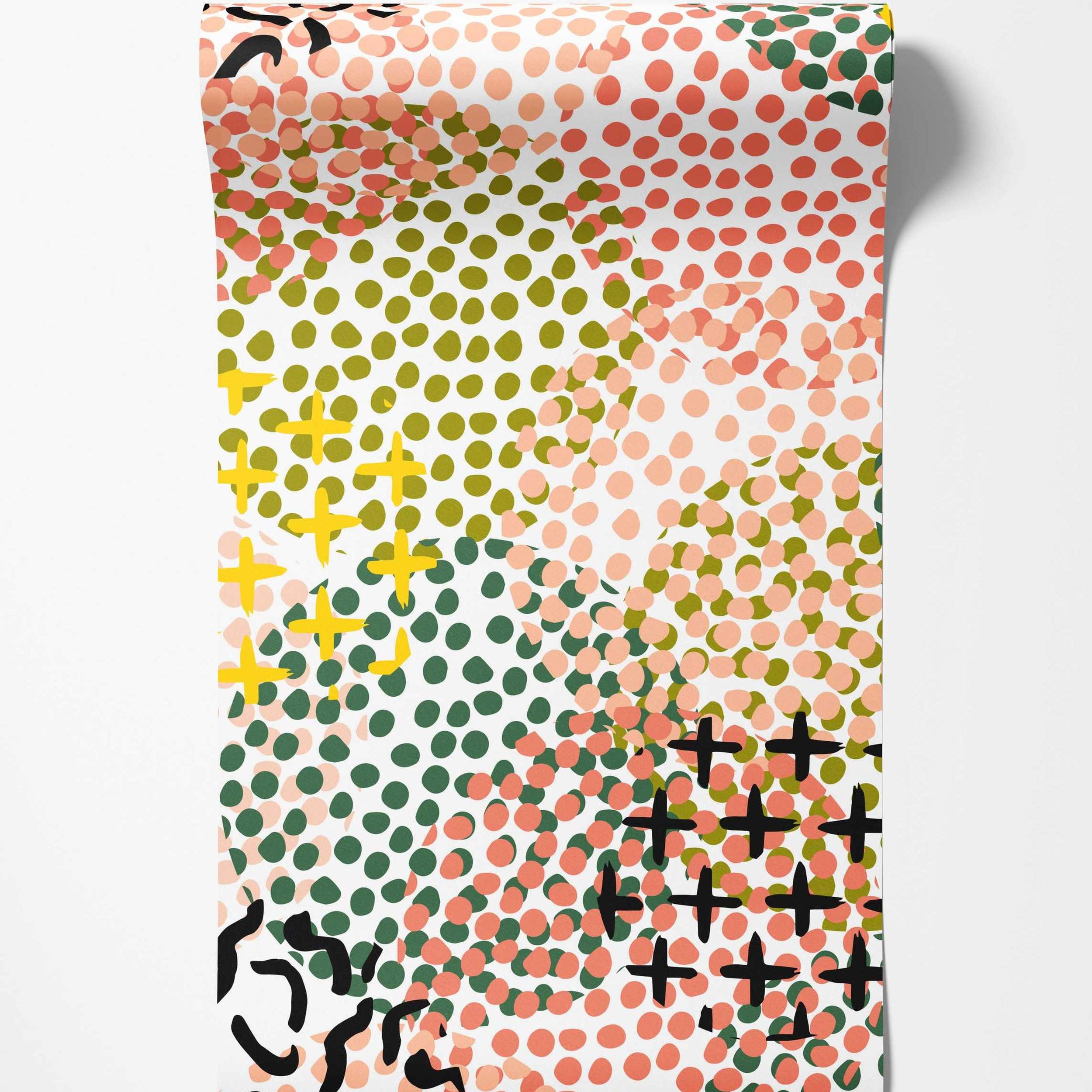 Abstract wallpaper with overlapping fields of coral, olive, and dark green dots, yellow plus signs, and black marks.