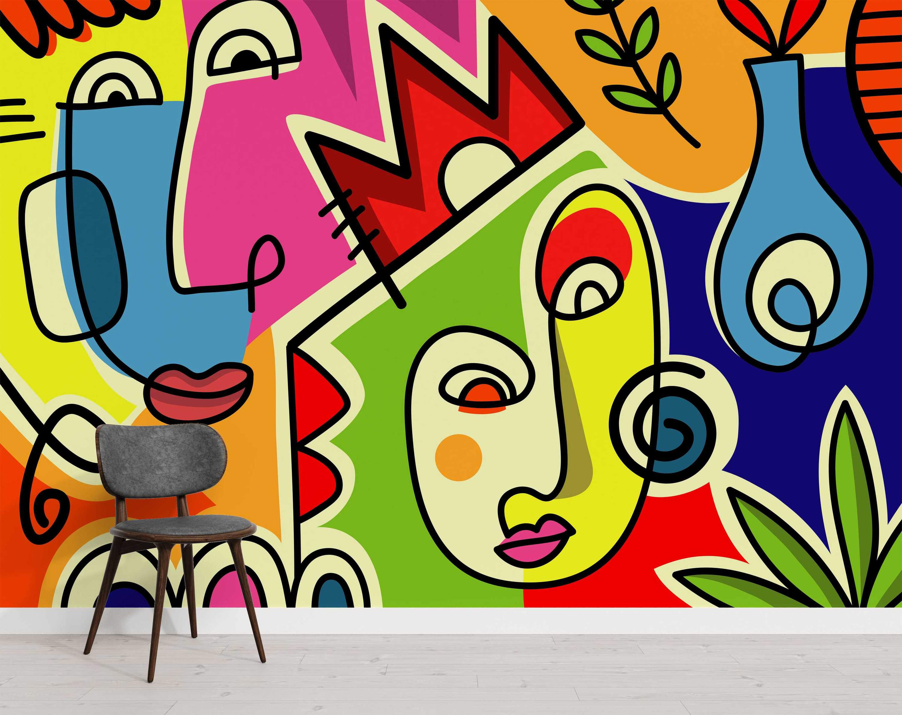 Abstract cubist-style mural with fragmented faces, bold black lines, and vibrant blocks of yellow, blue, green, red, and pink.