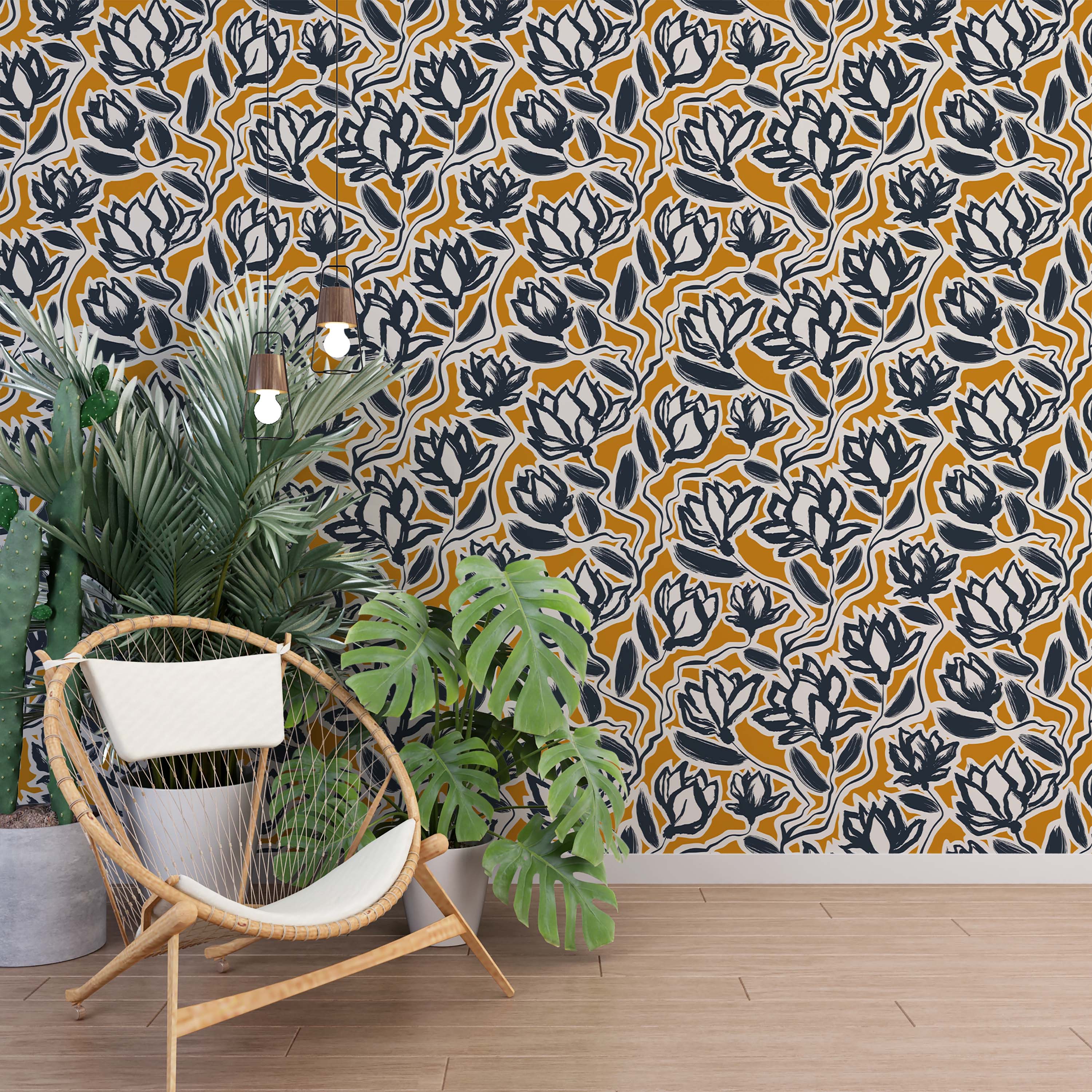 A wallpaper featuring a bold, abstract floral pattern. Stylized flowers in dark blue and off-white are set against a solid mustard yellow background.