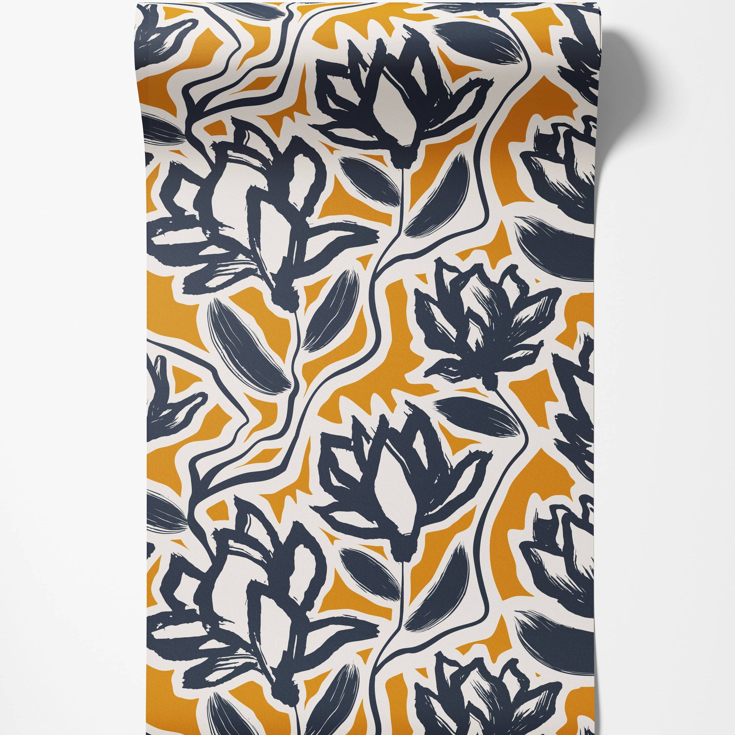 Abstract floral wallpaper with bold, dark blue brushstroke flowers on a mustard yellow and off-white background.