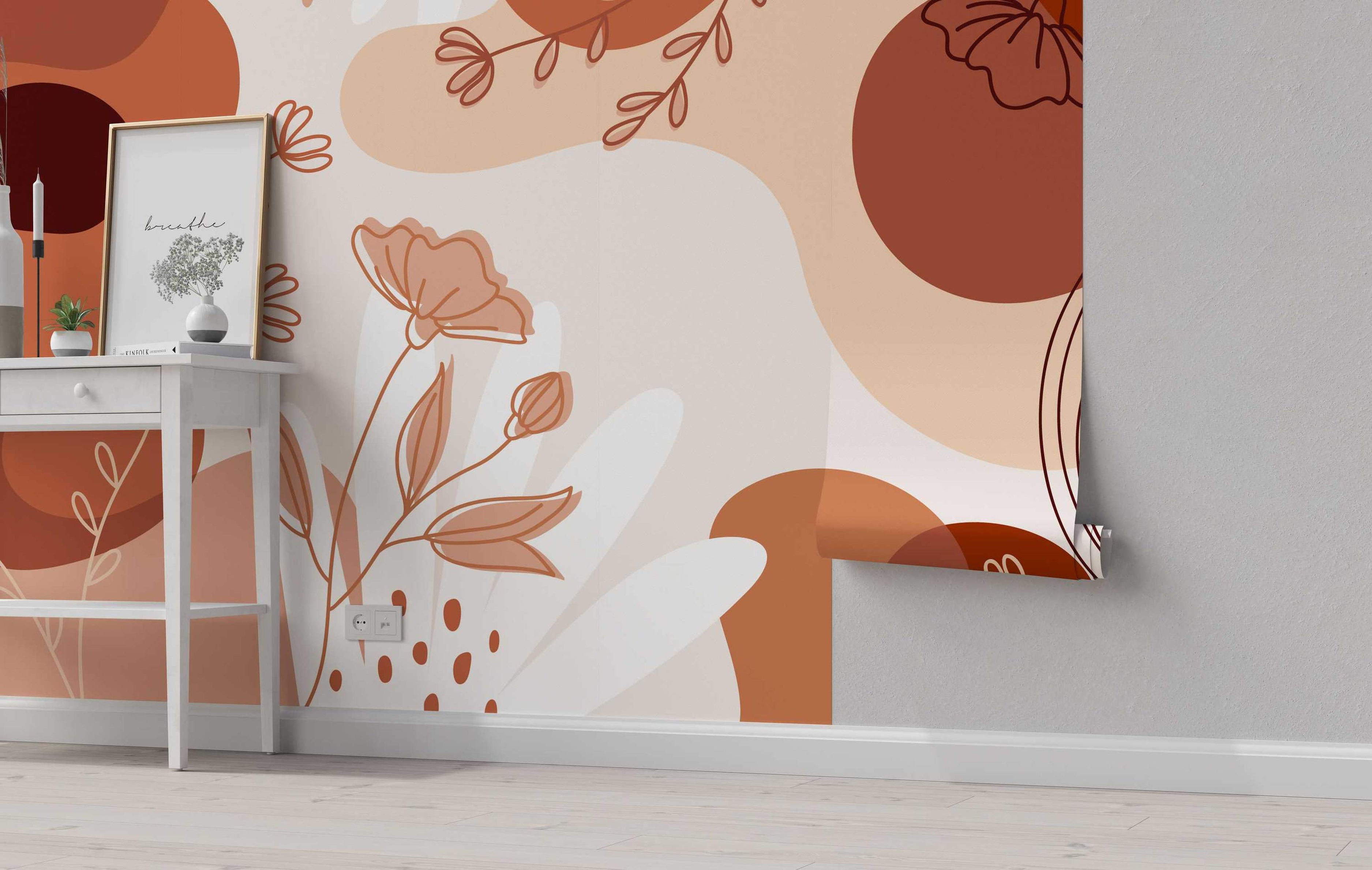 Mural featuring abstract organic shapes in terracotta, rust, and beige, overlaid with delicate floral line art.