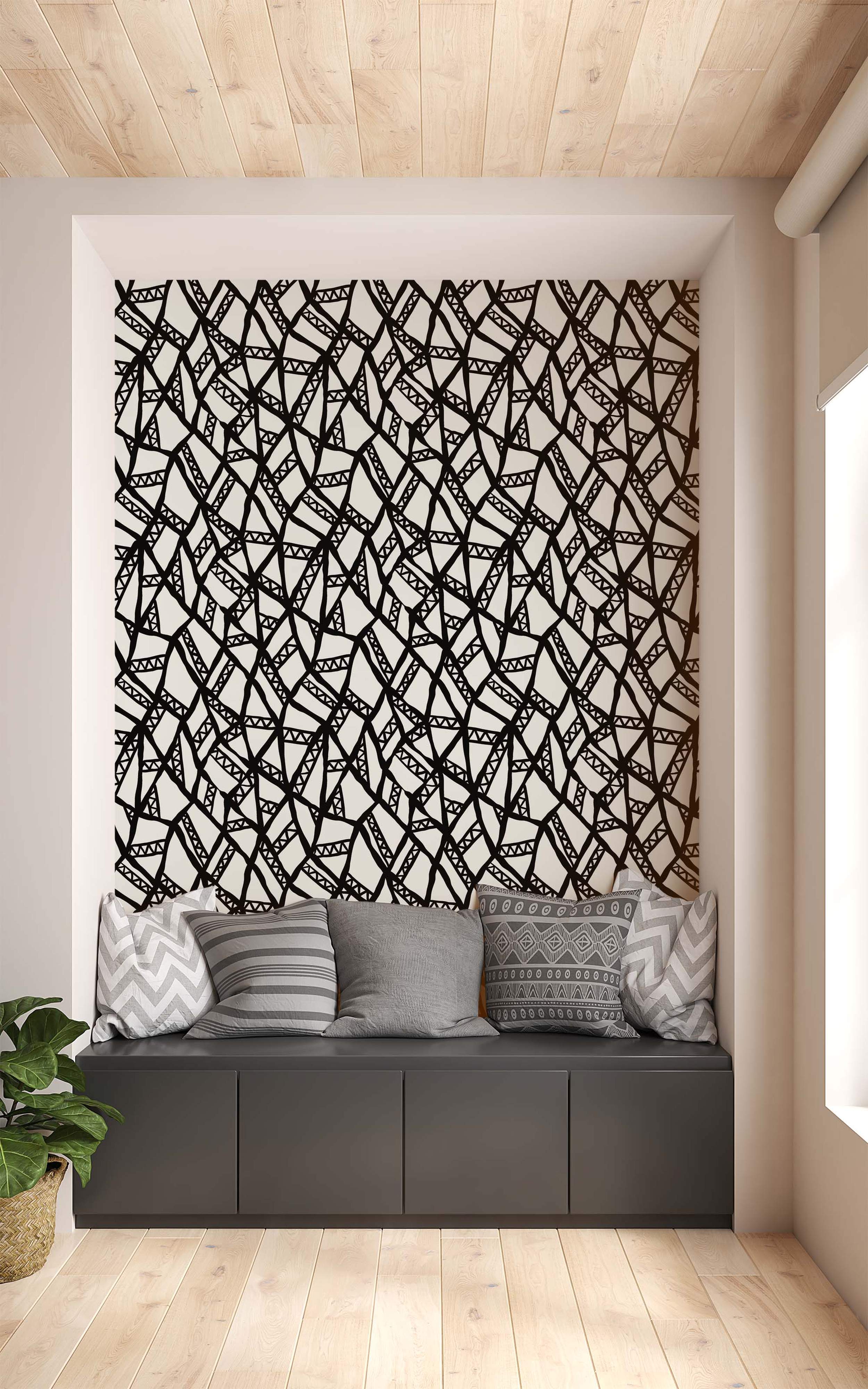 Abstract geometric wallpaper with bold, hand-drawn black lines forming irregular shapes and triangles on a white background.