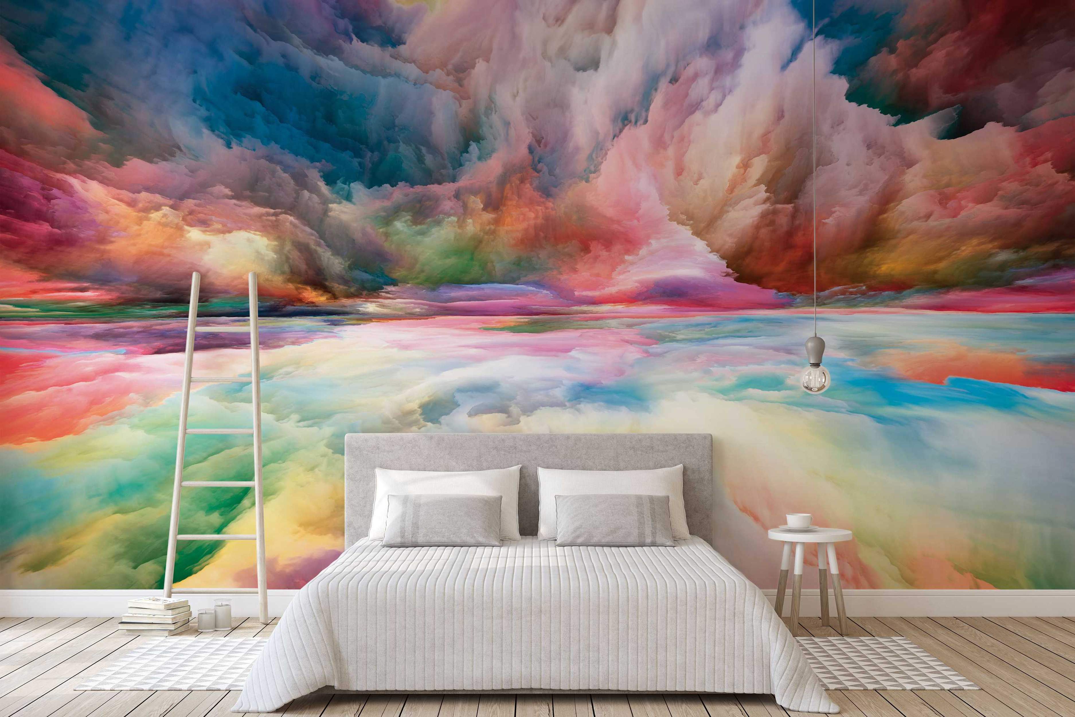 Abstract landscape mural with dramatic, colorful clouds painted in swirling shades of pink, blue, orange, and green.