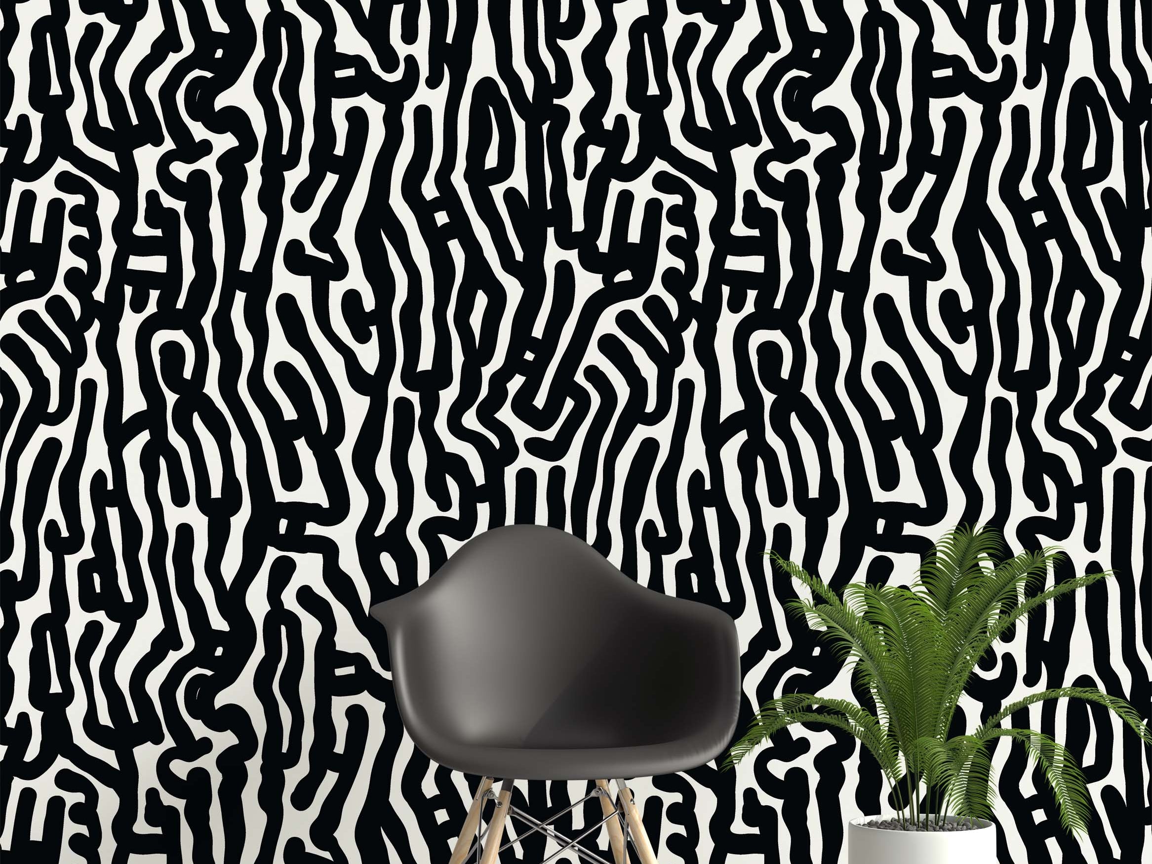 Wallpaper featuring a bold, abstract pattern of thick, meandering black lines on a white background.