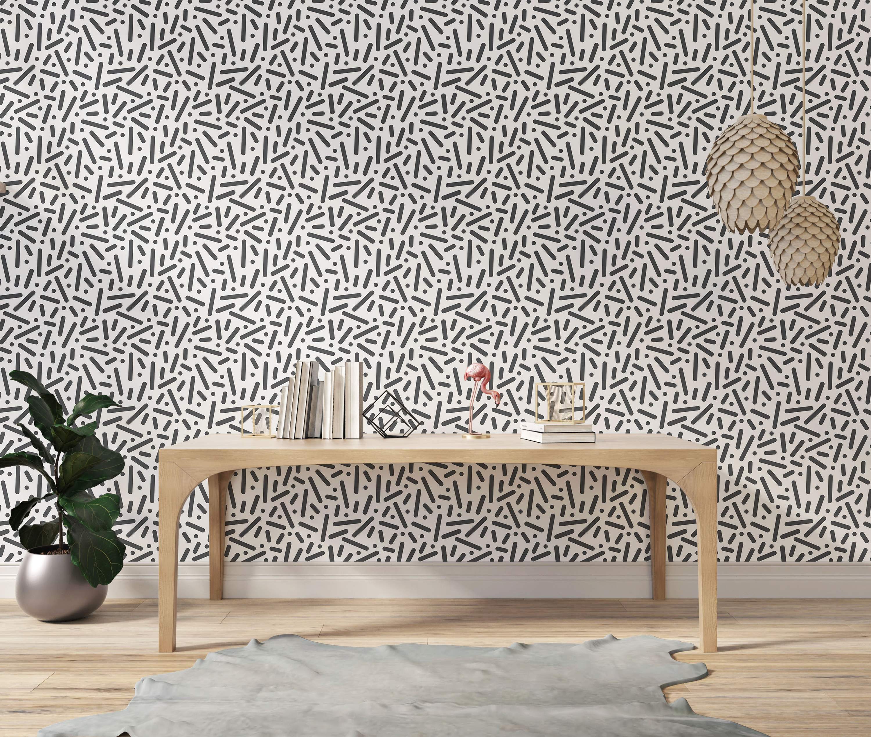 Wallpaper featuring a scattered abstract pattern of dark gray rounded lines and dots on a white background.