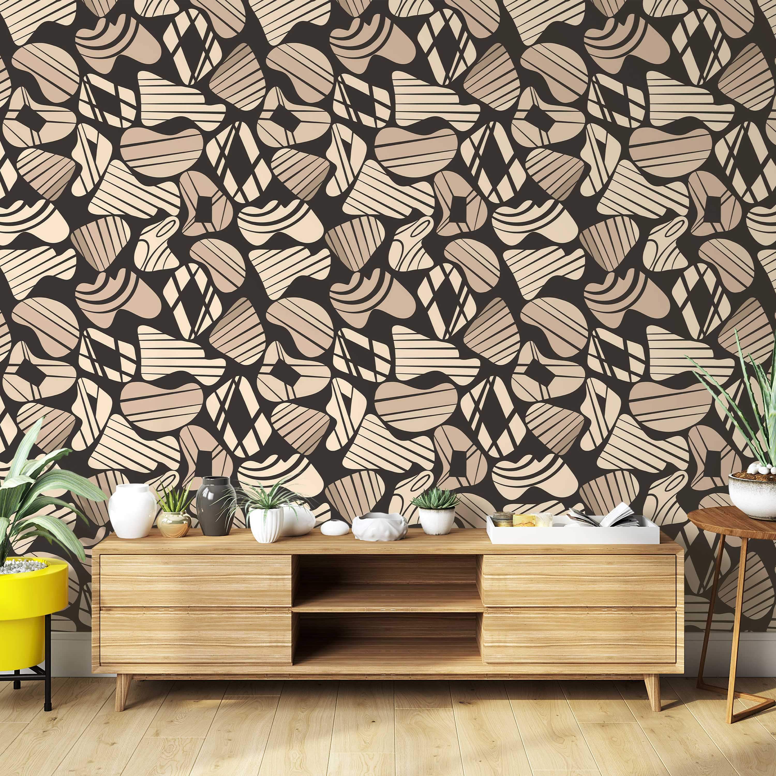Abstract wallpaper with organic, rounded shapes in beige and tan featuring striped and diamond patterns on a dark brown background.