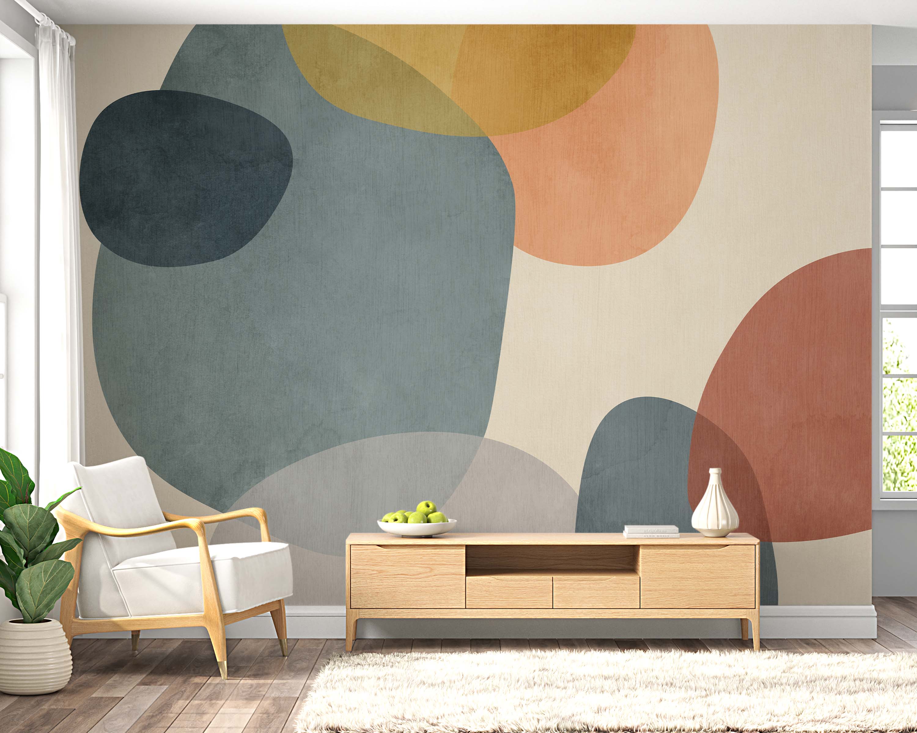 Abstract mural with layered, textured oval forms in teal, peach, yellow, terracotta, and gray on a light beige background.