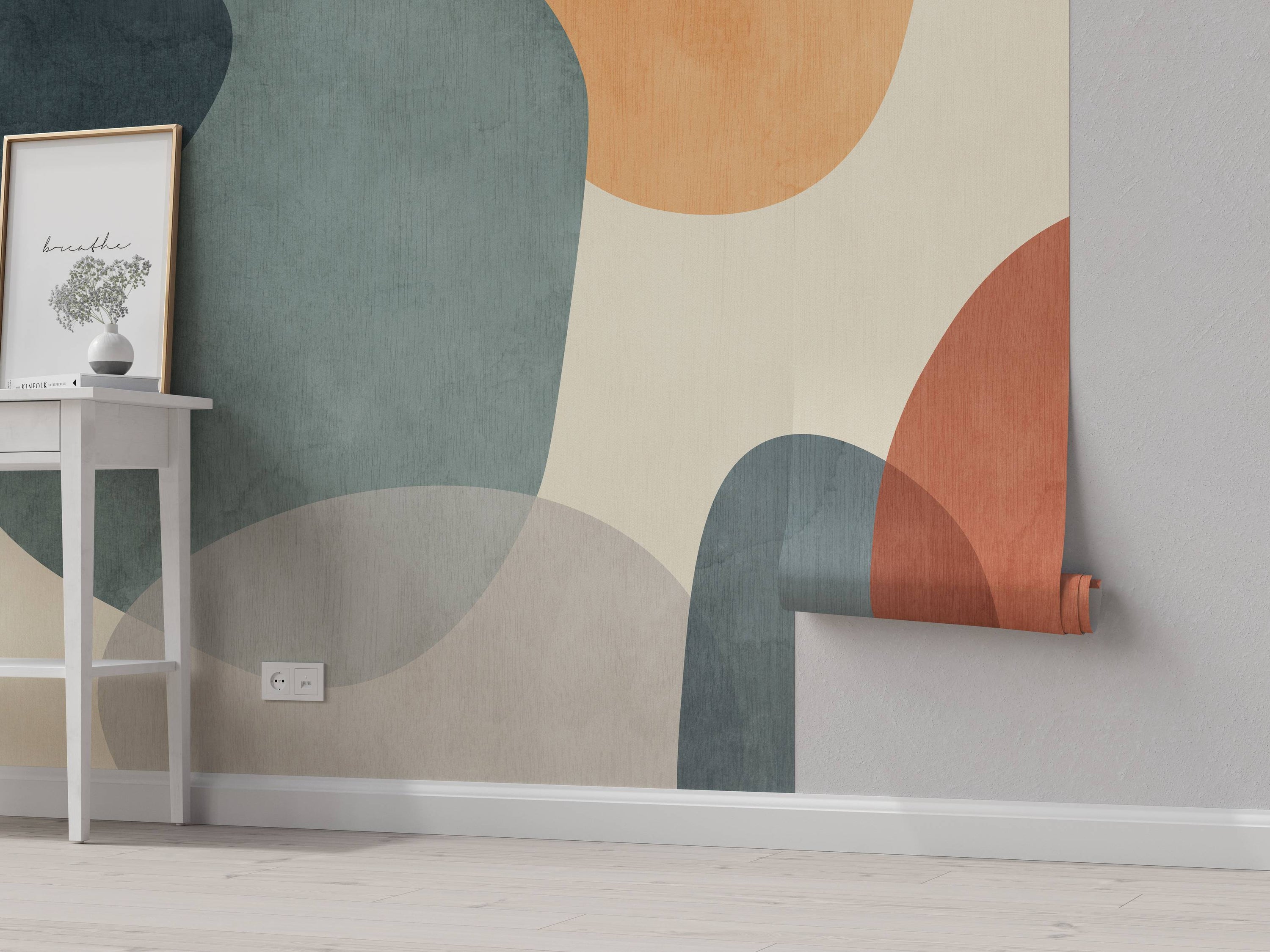 Mural featuring overlapping abstract organic shapes in muted teal, orange, and beige tones, with a subtle textured effect.