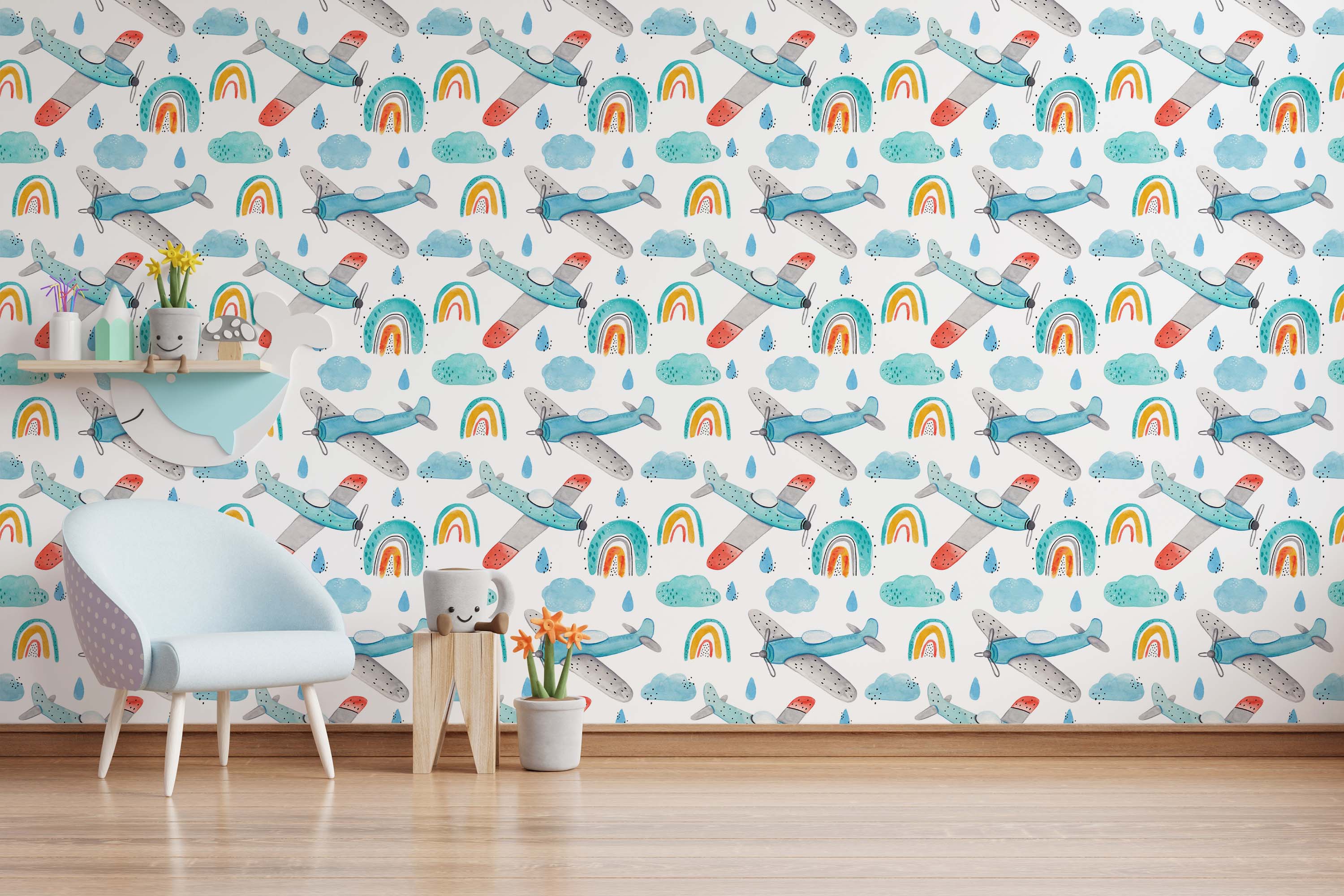 Watercolor wallpaper with a repeating pattern of blue and gray airplanes, colorful rainbows, light blue clouds, and raindrops.