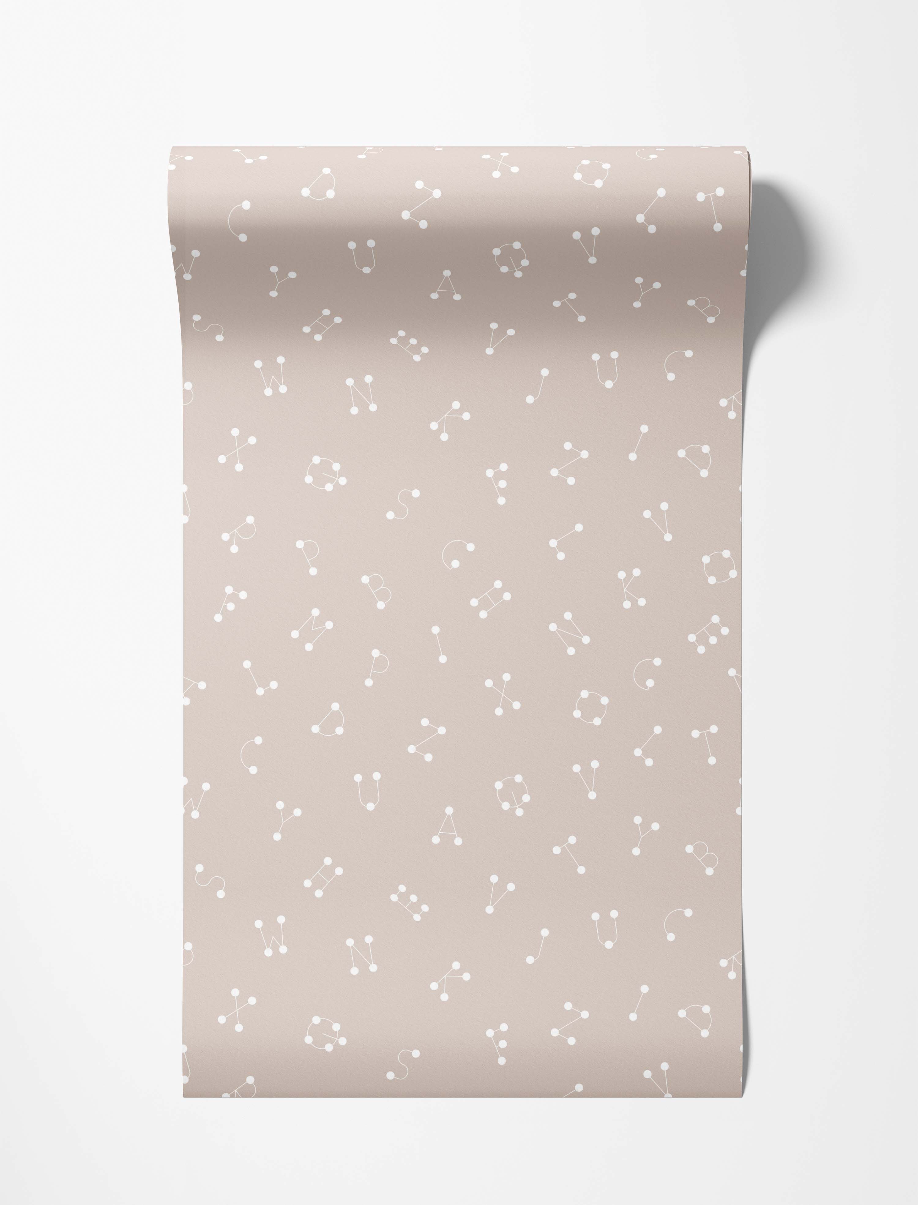 Wallpaper with a repeating pattern of stylized alphabet letters as white constellations on a soft beige background.