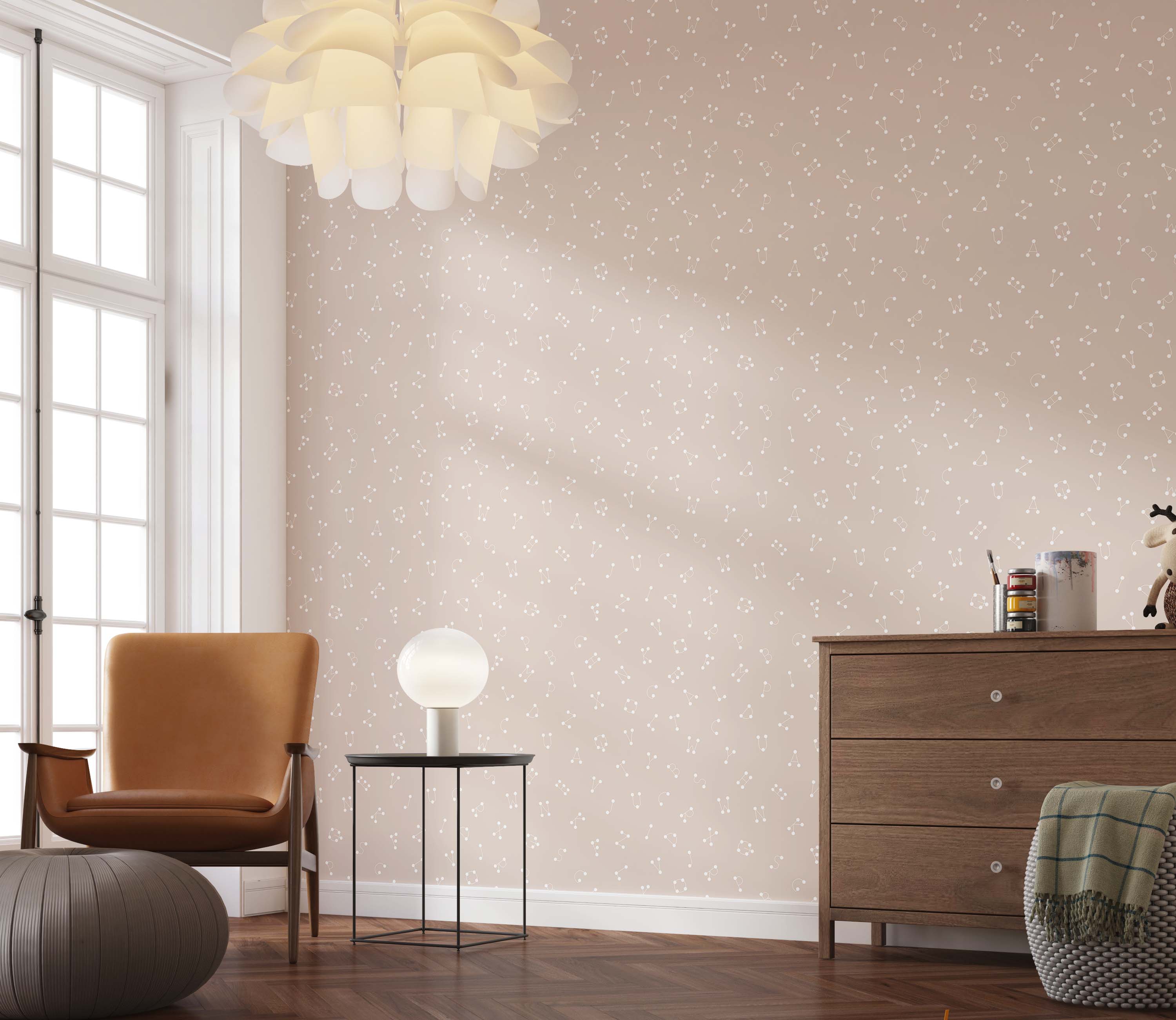 Wallpaper with white, dot-style alphabet letters creating a constellation-like pattern on a soft pink background.