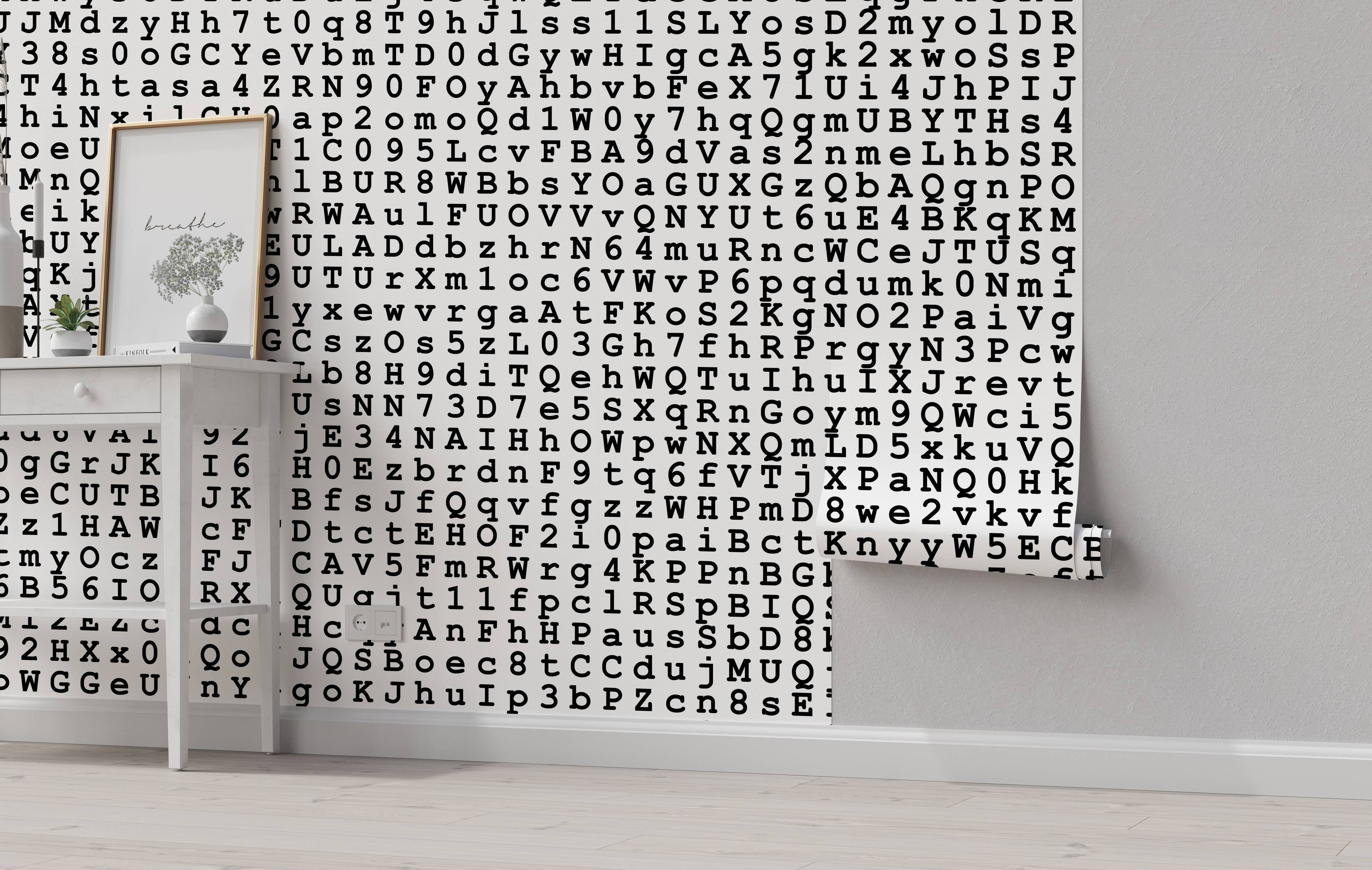 Wallpaper with a repeating pattern of black typewriter-style letters and numbers on a white background.