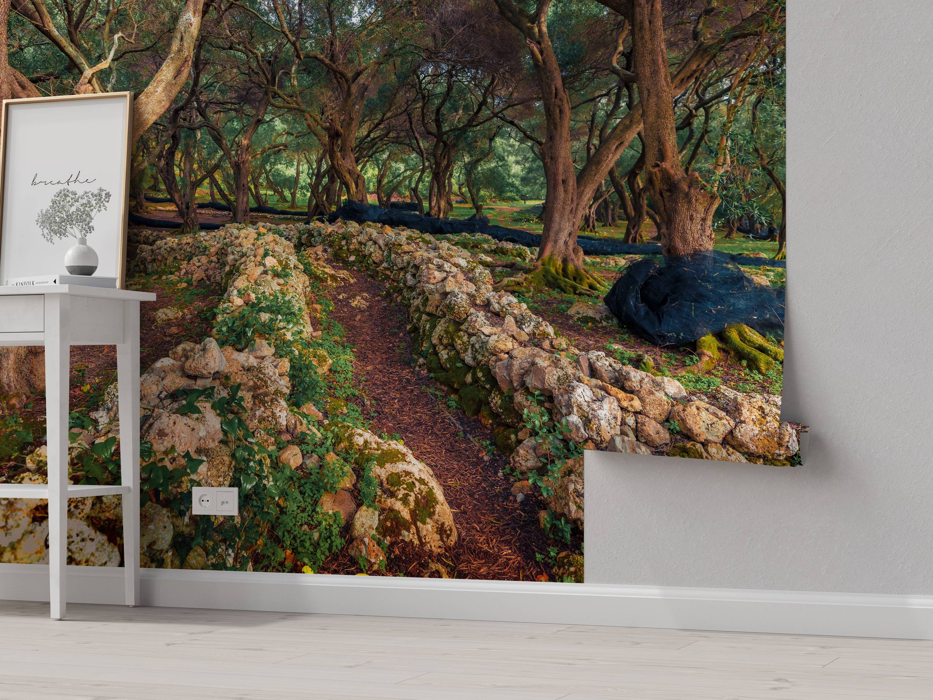 A photorealistic mural of an ancient olive grove with gnarled trees, a mossy stone path, and lush green foliage.
