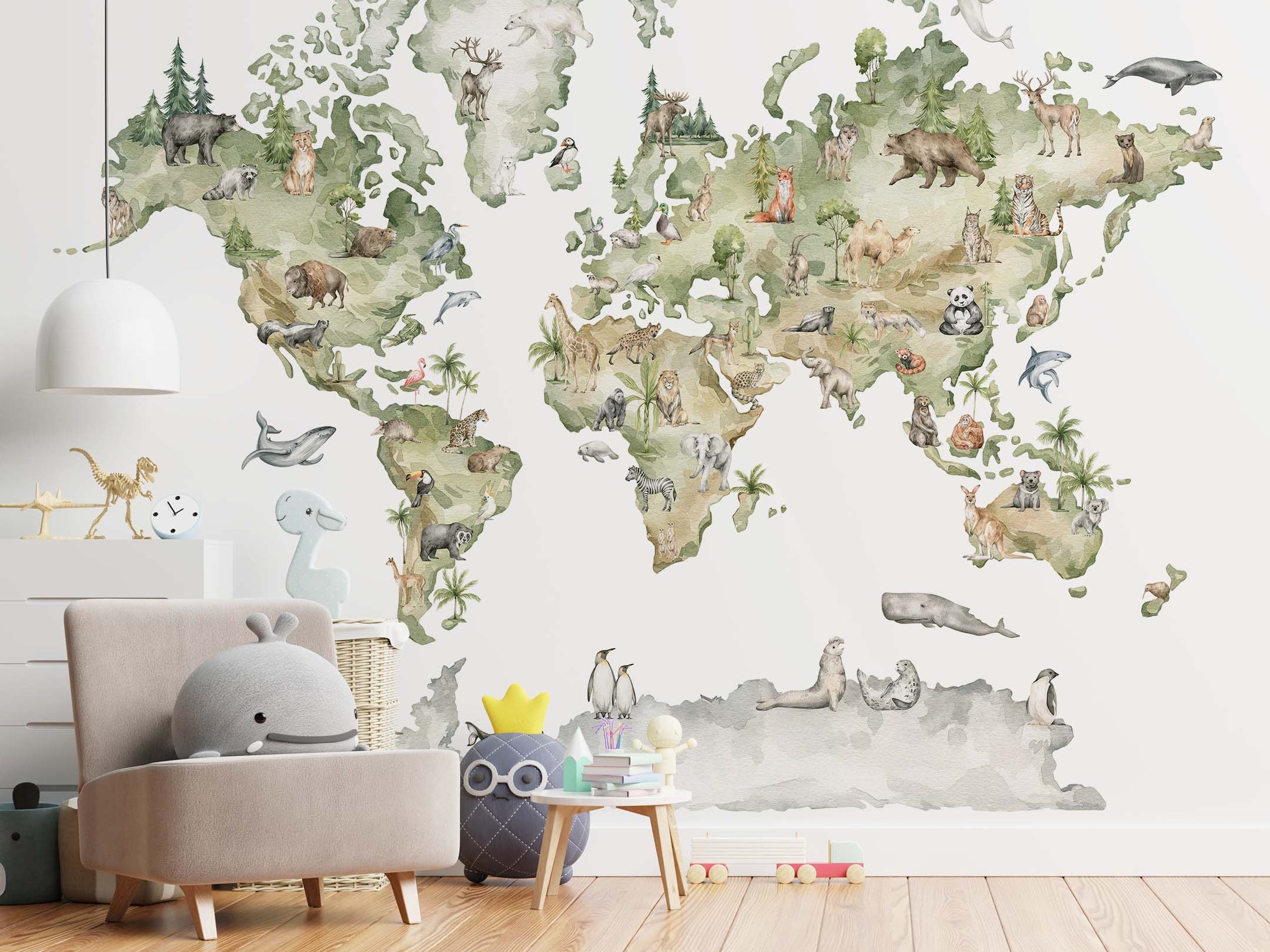Watercolor world map mural featuring illustrated animals on green and gray continents against a white background.