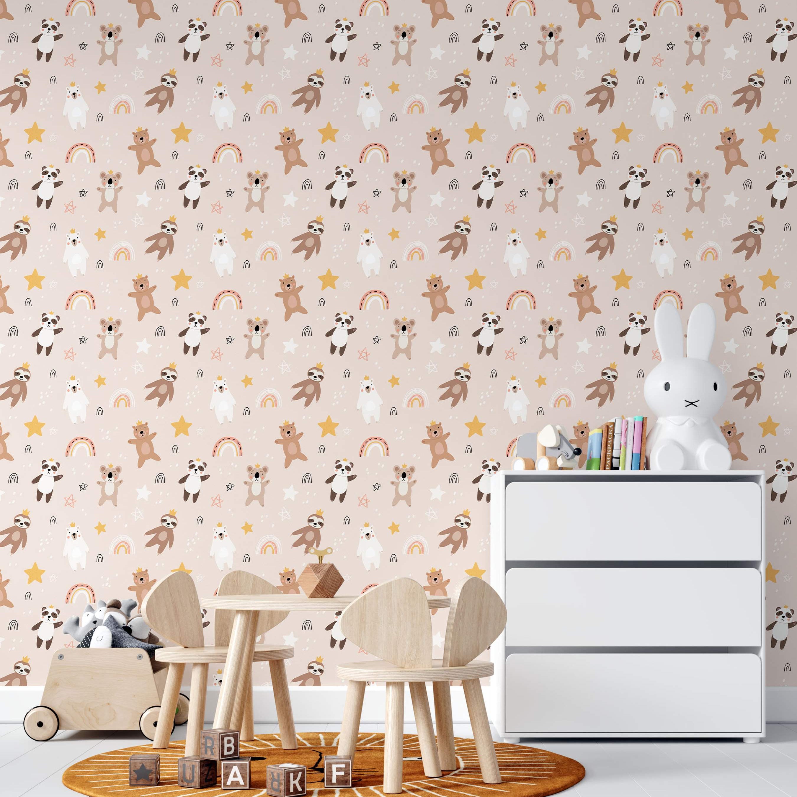 Cute animal wallpaper with crowned bears, pandas, sloths, and koalas, plus rainbows and stars on a pale pink background.
