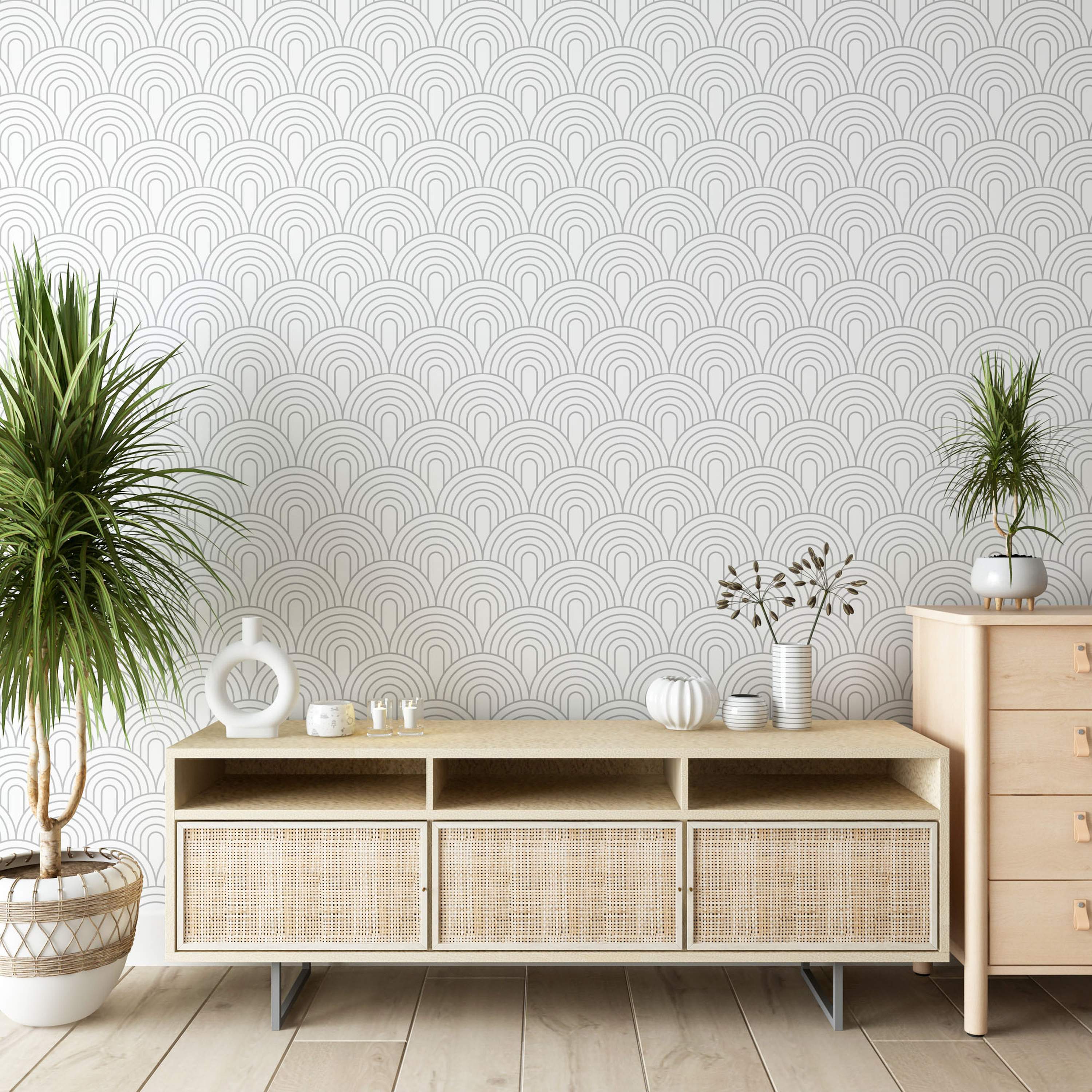 Geometric wallpaper with a repeating pattern of nested grey arches outlined on a clean white background.