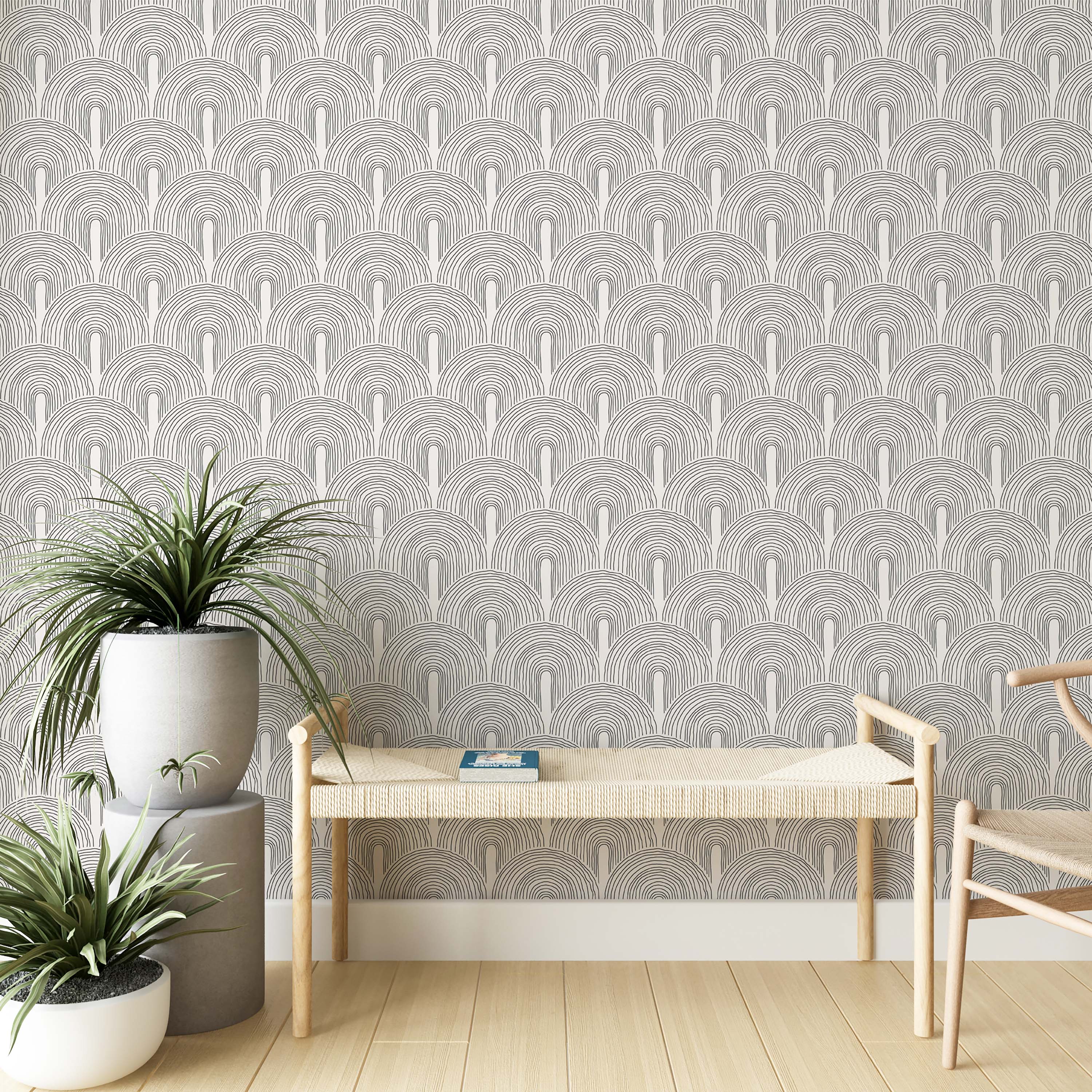 Wallpaper featuring repeating hand-drawn black line art arches creating a geometric pattern on a white background.