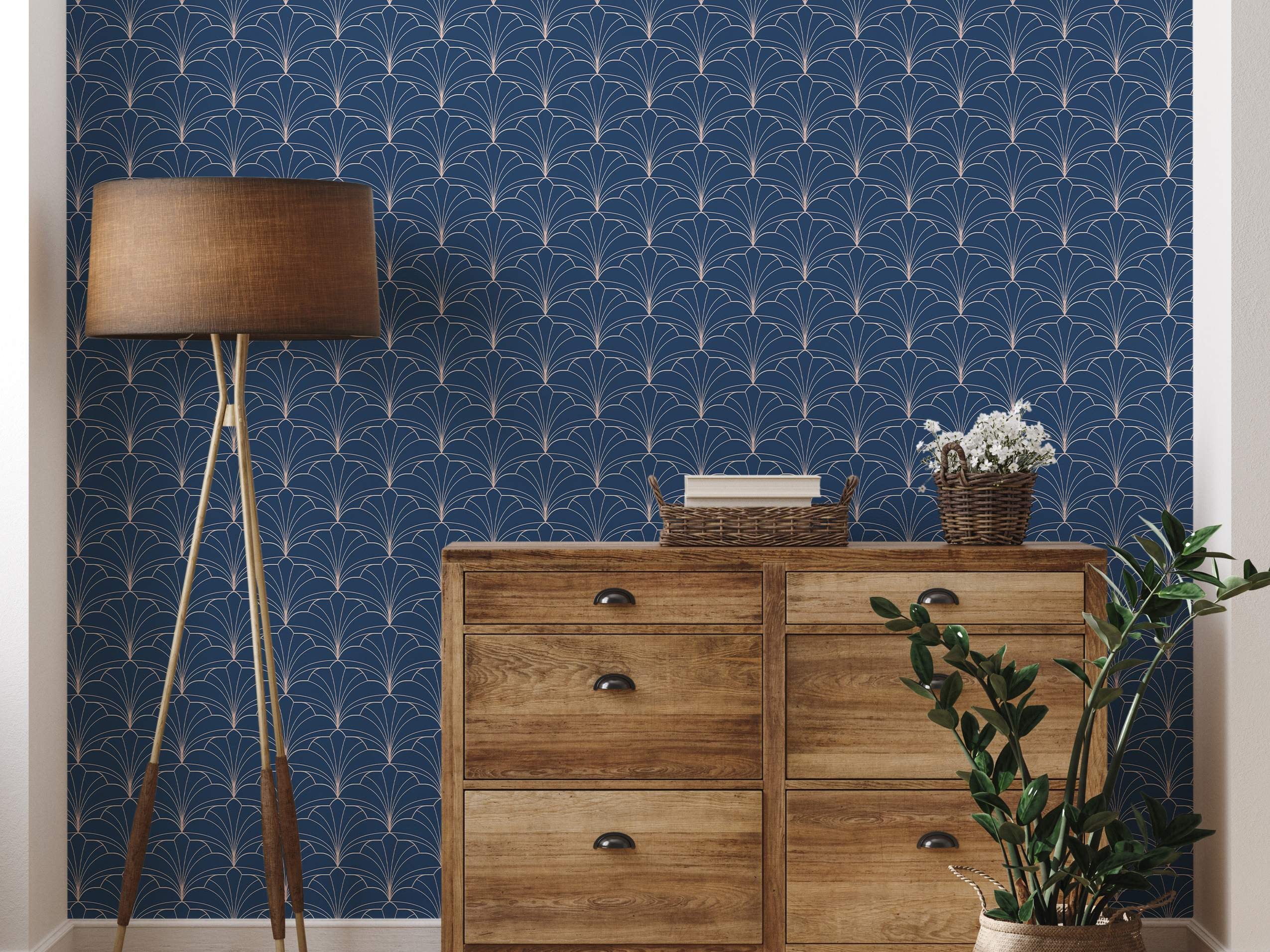 Art Deco style wallpaper with repeating geometric fan shapes outlined in thin gold lines on a dark navy blue background.