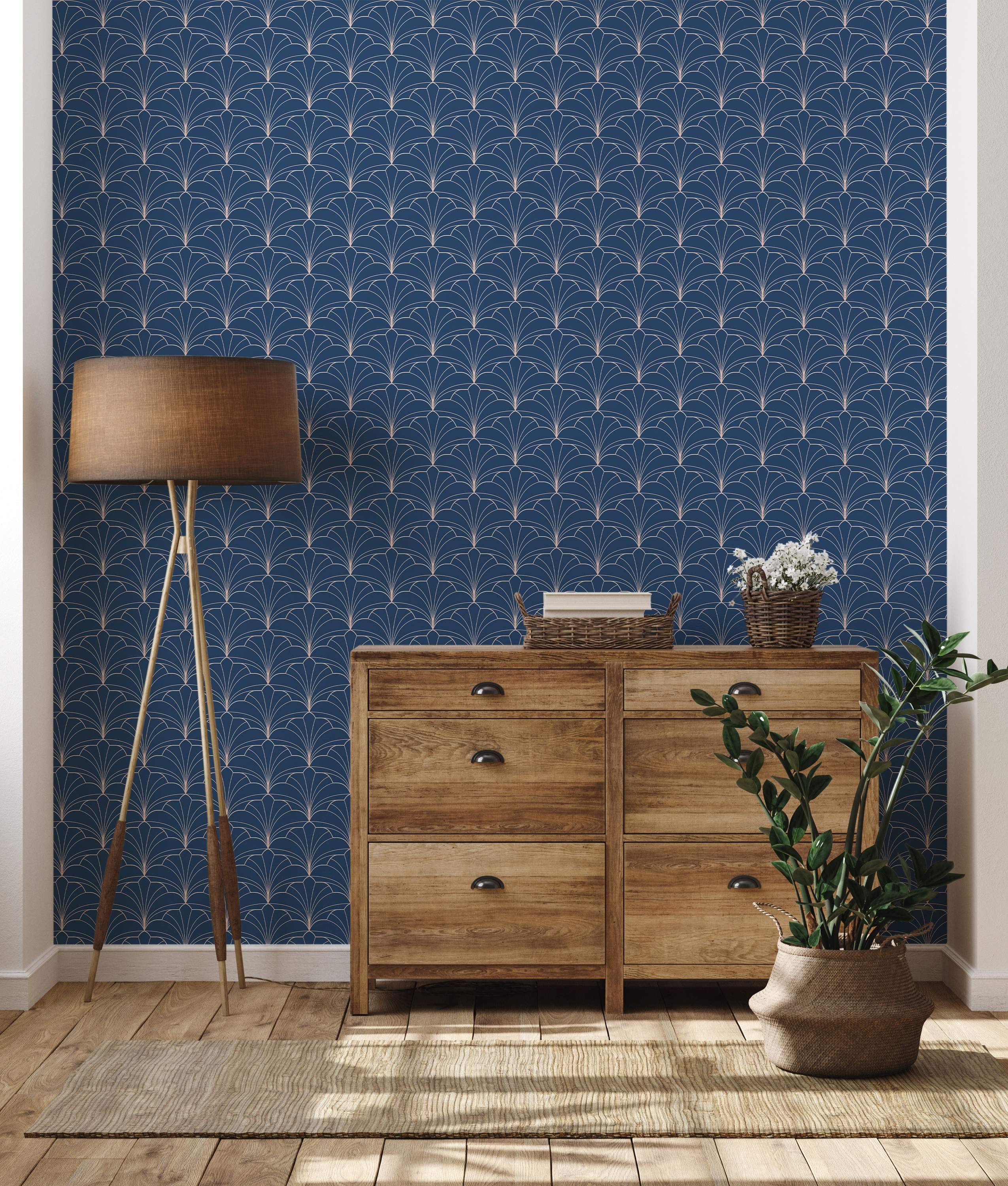 Art Deco style wallpaper with repeating geometric fan shapes outlined in thin gold lines on a dark navy blue background.