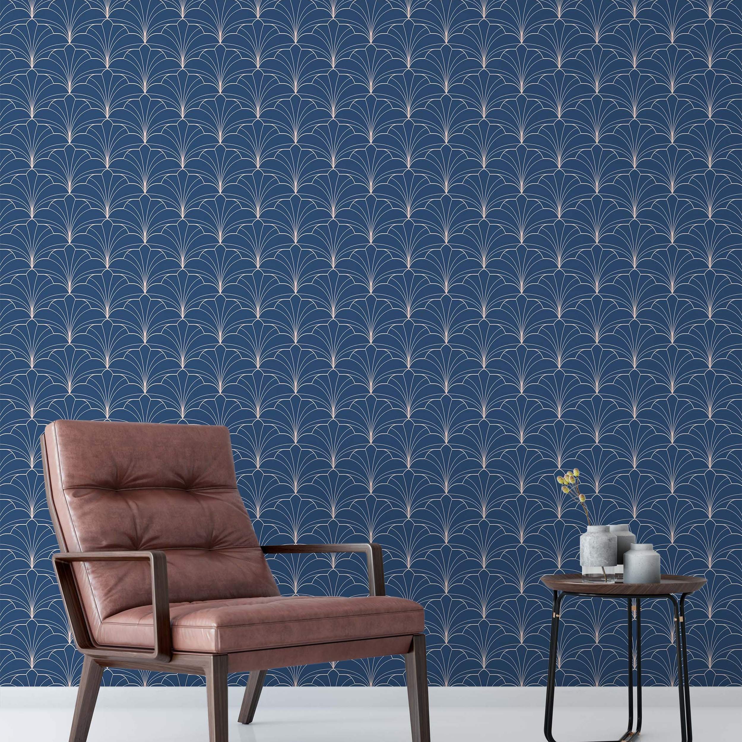 Art Deco geometric fan pattern wallpaper with thin rose gold lines on a deep navy blue background.