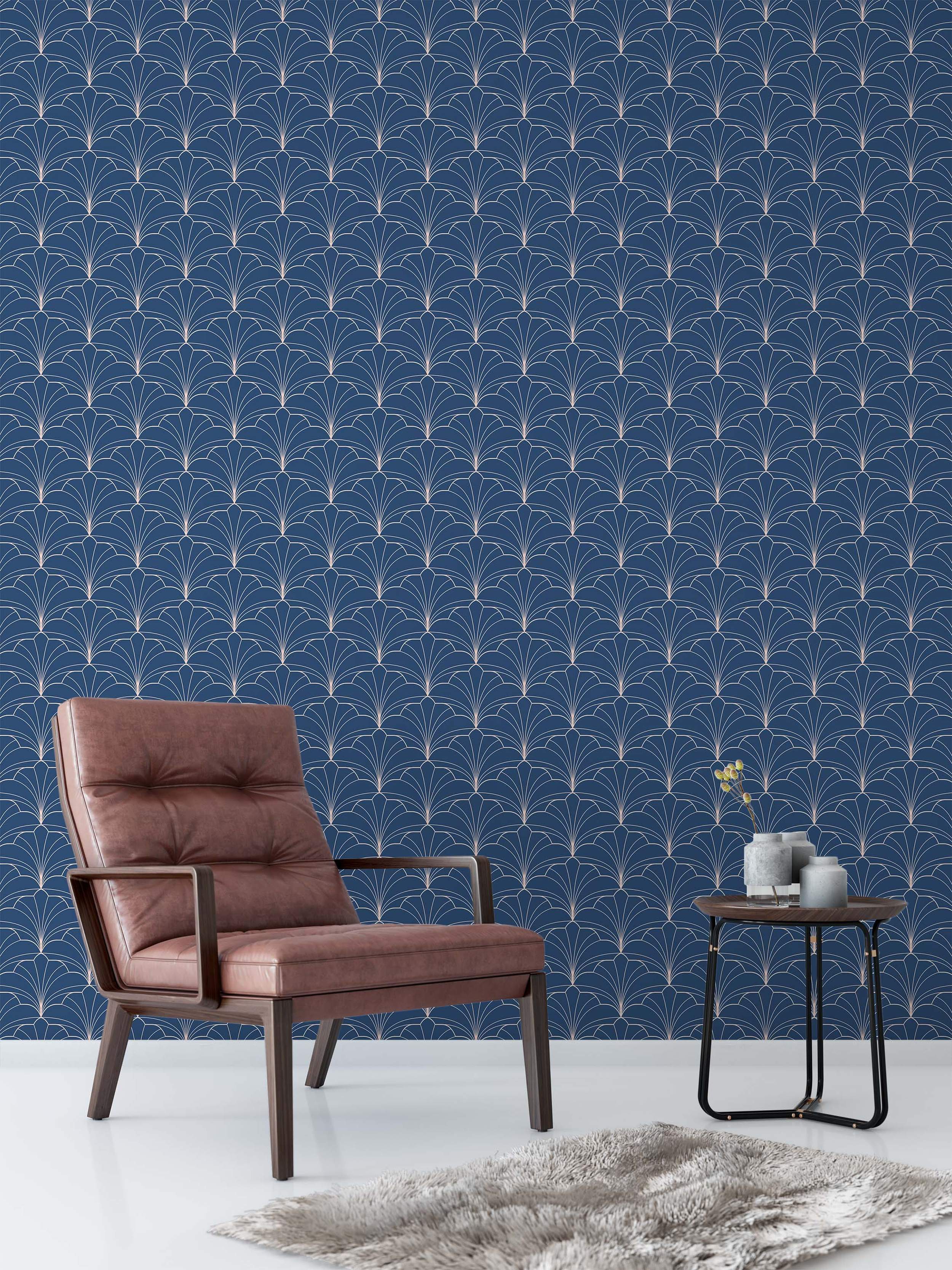 Art Deco geometric fan pattern wallpaper with thin rose gold lines on a deep navy blue background.