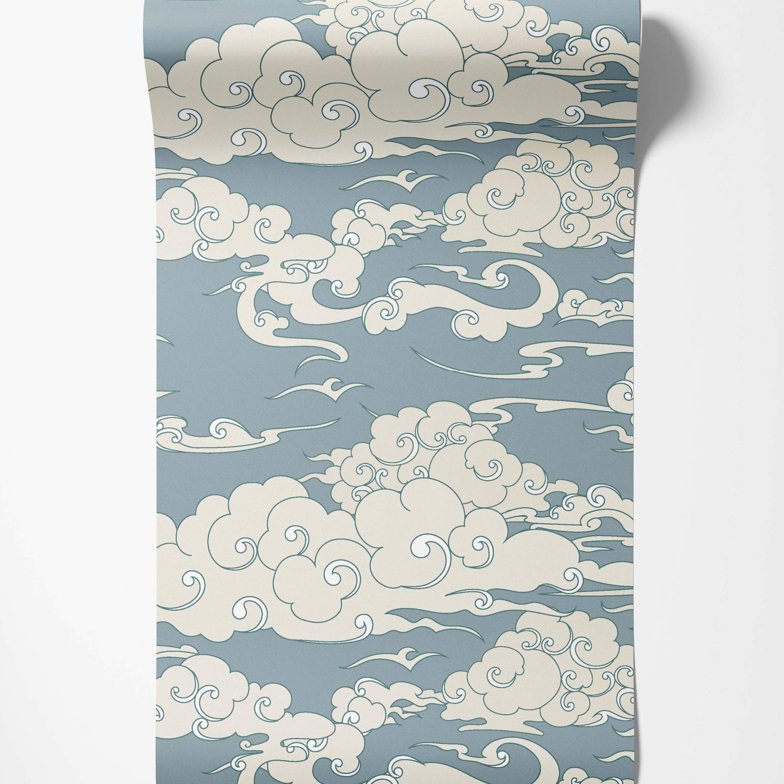 Stylized East Asian cloud wallpaper with swirling cream clouds outlined in dark blue against a dusty blue background.