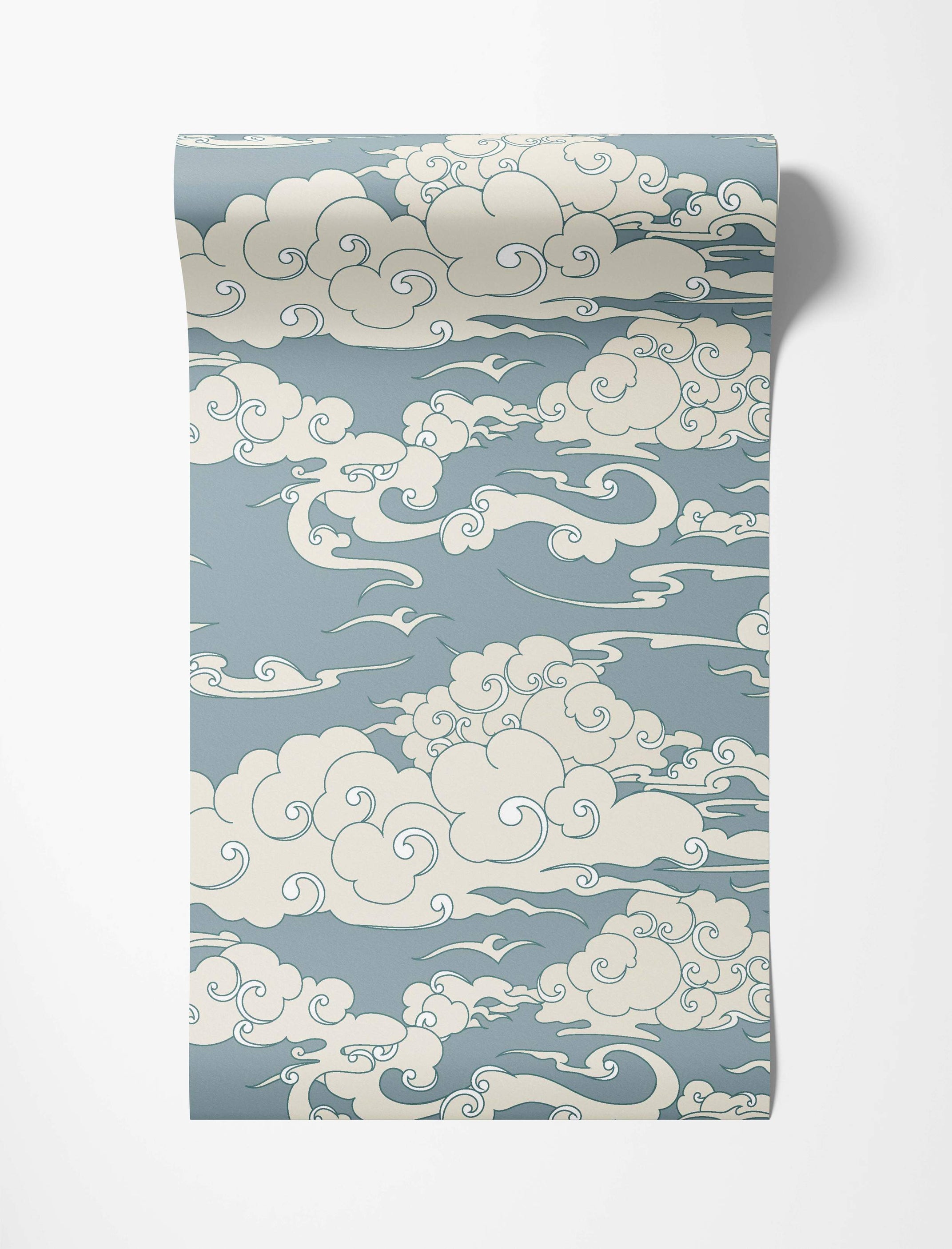 Stylized East Asian cloud wallpaper with swirling cream clouds outlined in dark blue against a dusty blue background.