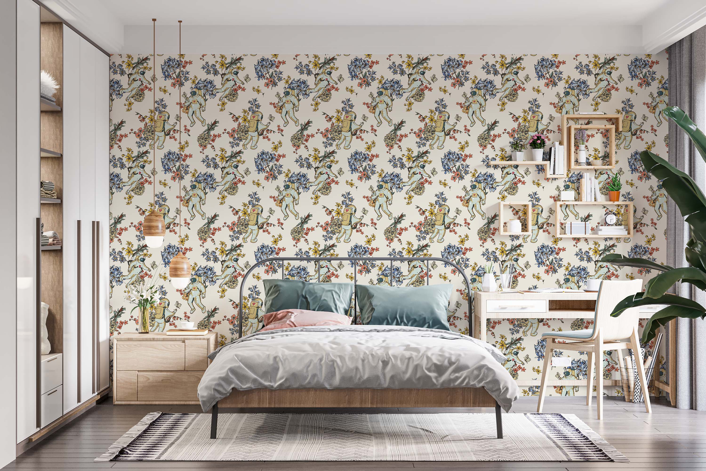 Whimsical wallpaper featuring illustrated astronauts floating among blue, yellow, and coral floral arrangements on a cream background.