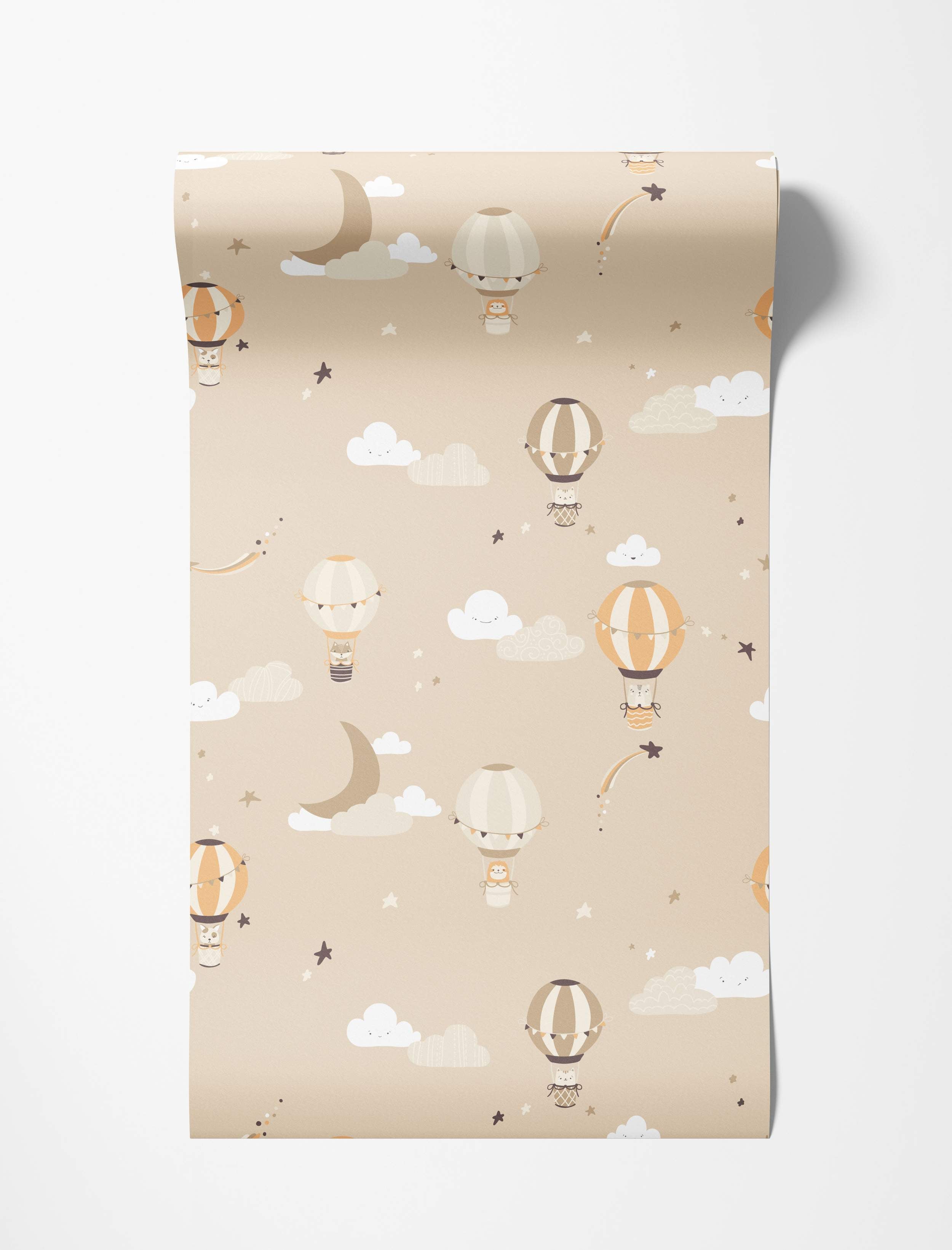Wallpaper with cartoon animals in hot air balloons, clouds, stars, and moons on a beige background. Soft white, orange, brown tones.