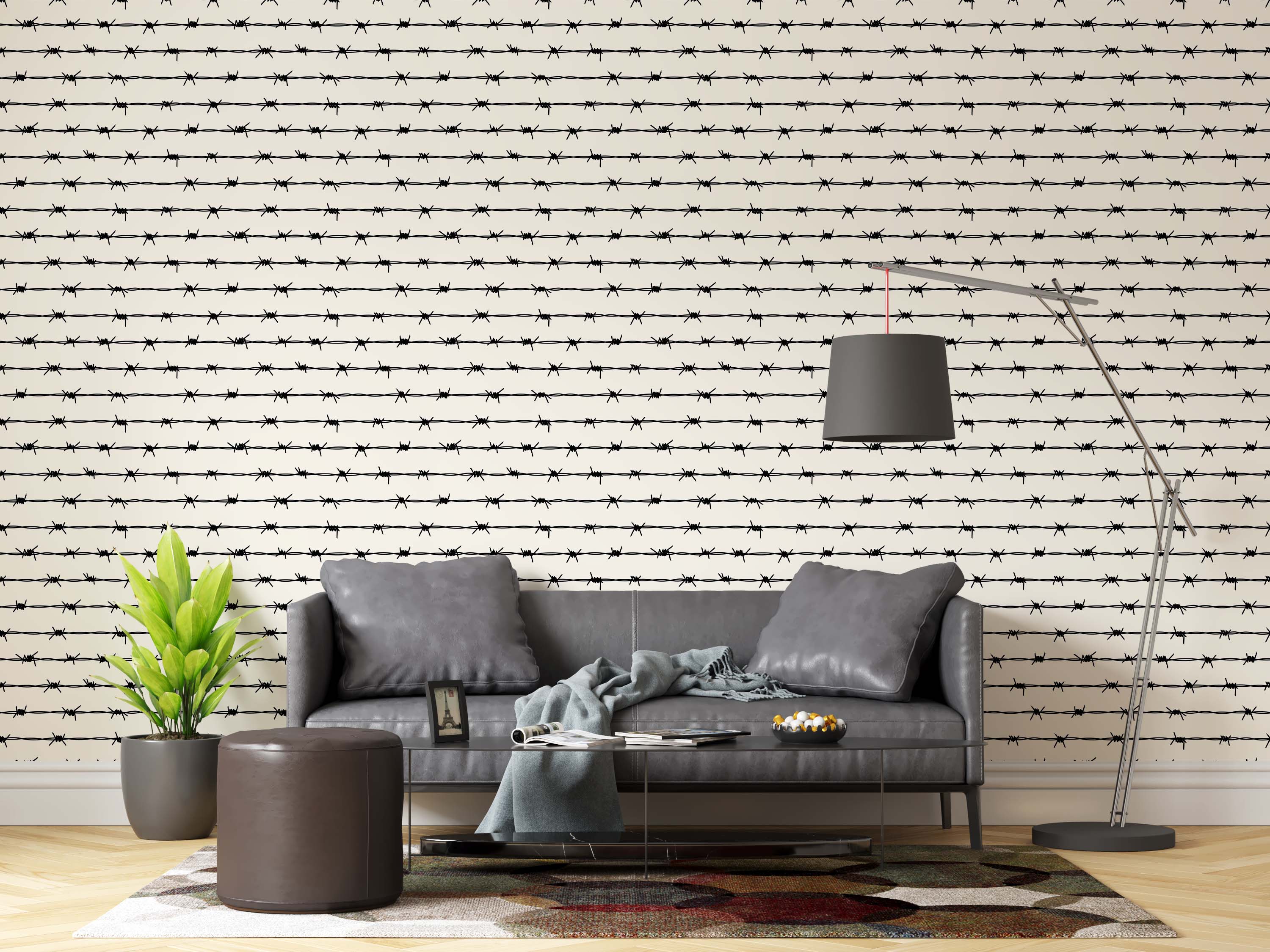 Wallpaper featuring a repeating pattern of horizontal black barbed wire lines on a pale cream background.