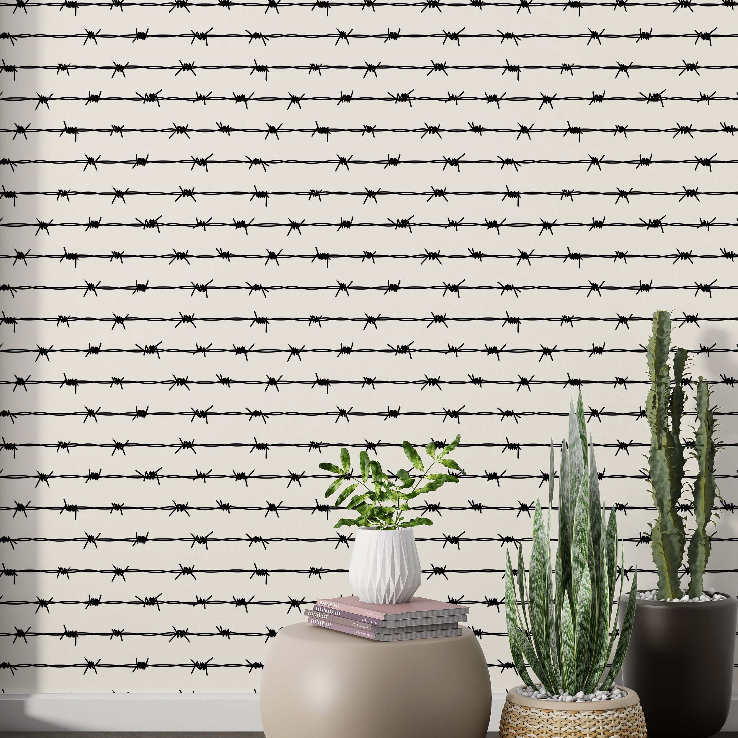 Wallpaper with horizontal lines of black barbed wire on a cream background.