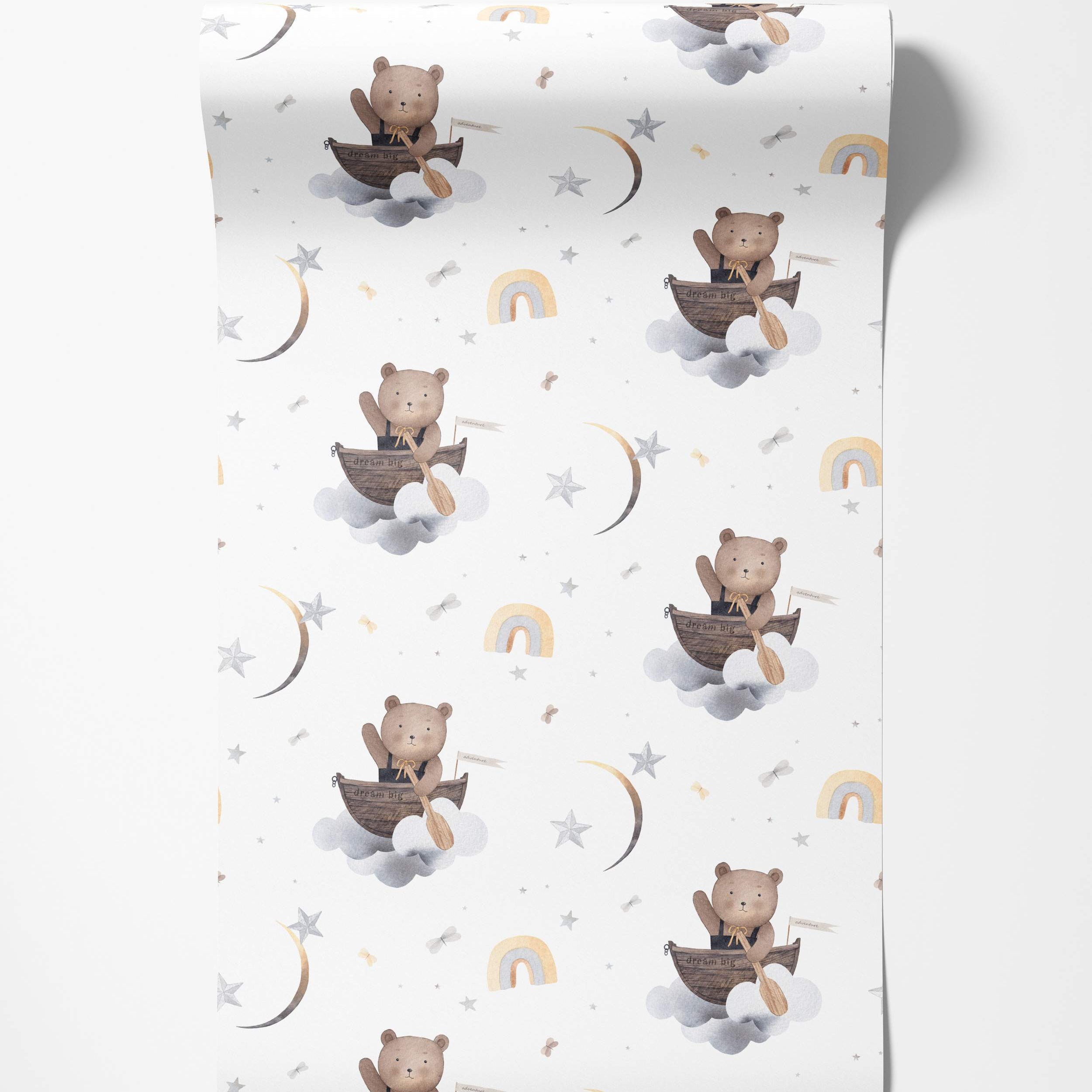 Cute wallpaper with watercolor teddy bears rowing boats on gray clouds, surrounded by yellow moons, stars, and rainbows.