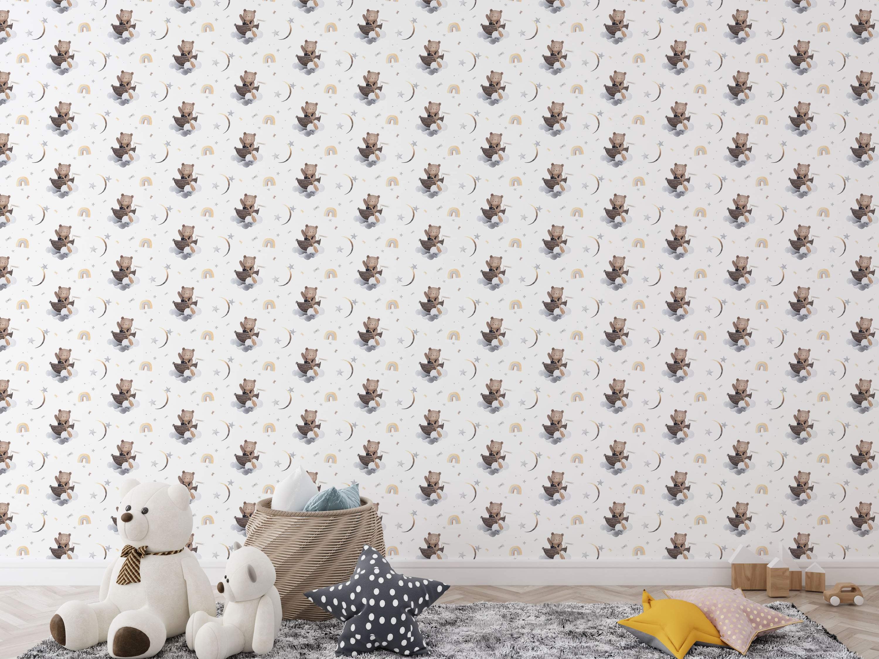 Watercolor wallpaper featuring teddy bears rowing boats on clouds amid crescent moons, stars, and rainbows in brown, gray, and yellow.
