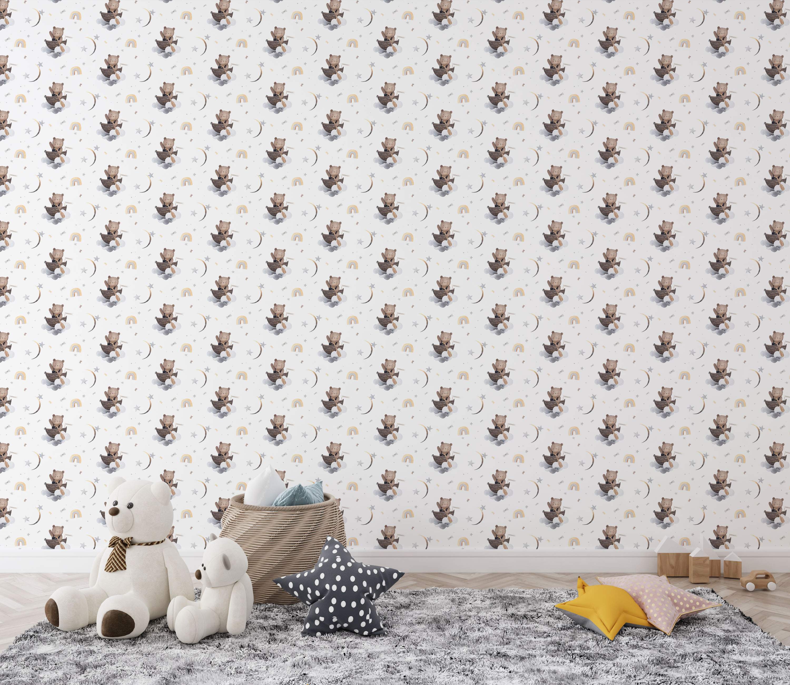 Watercolor wallpaper featuring teddy bears rowing boats on clouds amid crescent moons, stars, and rainbows in brown, gray, and yellow.