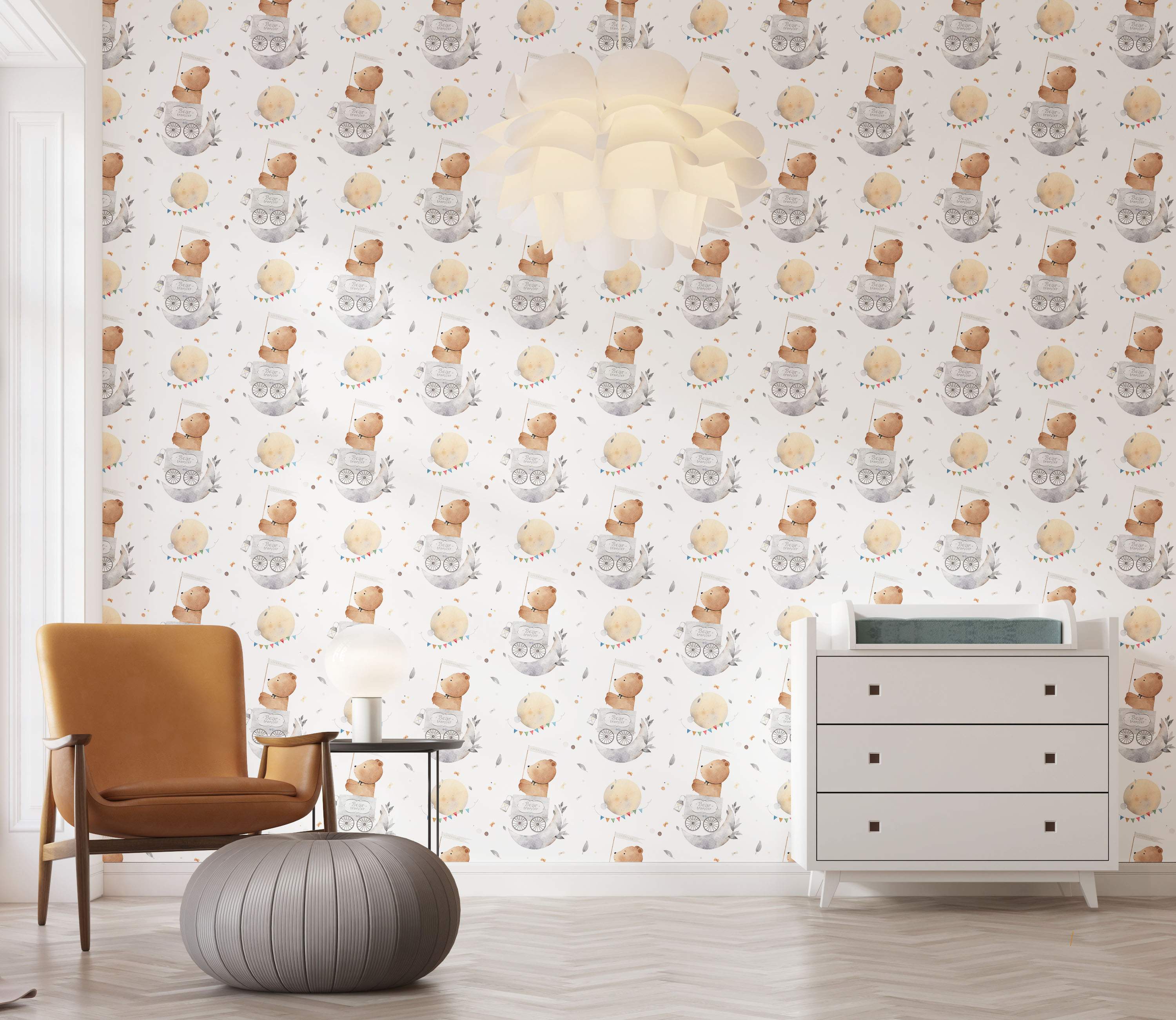 Watercolor wallpaper featuring a repeating pattern of brown bears in grey moon carts, yellow moons with bunting, and grey feathers.