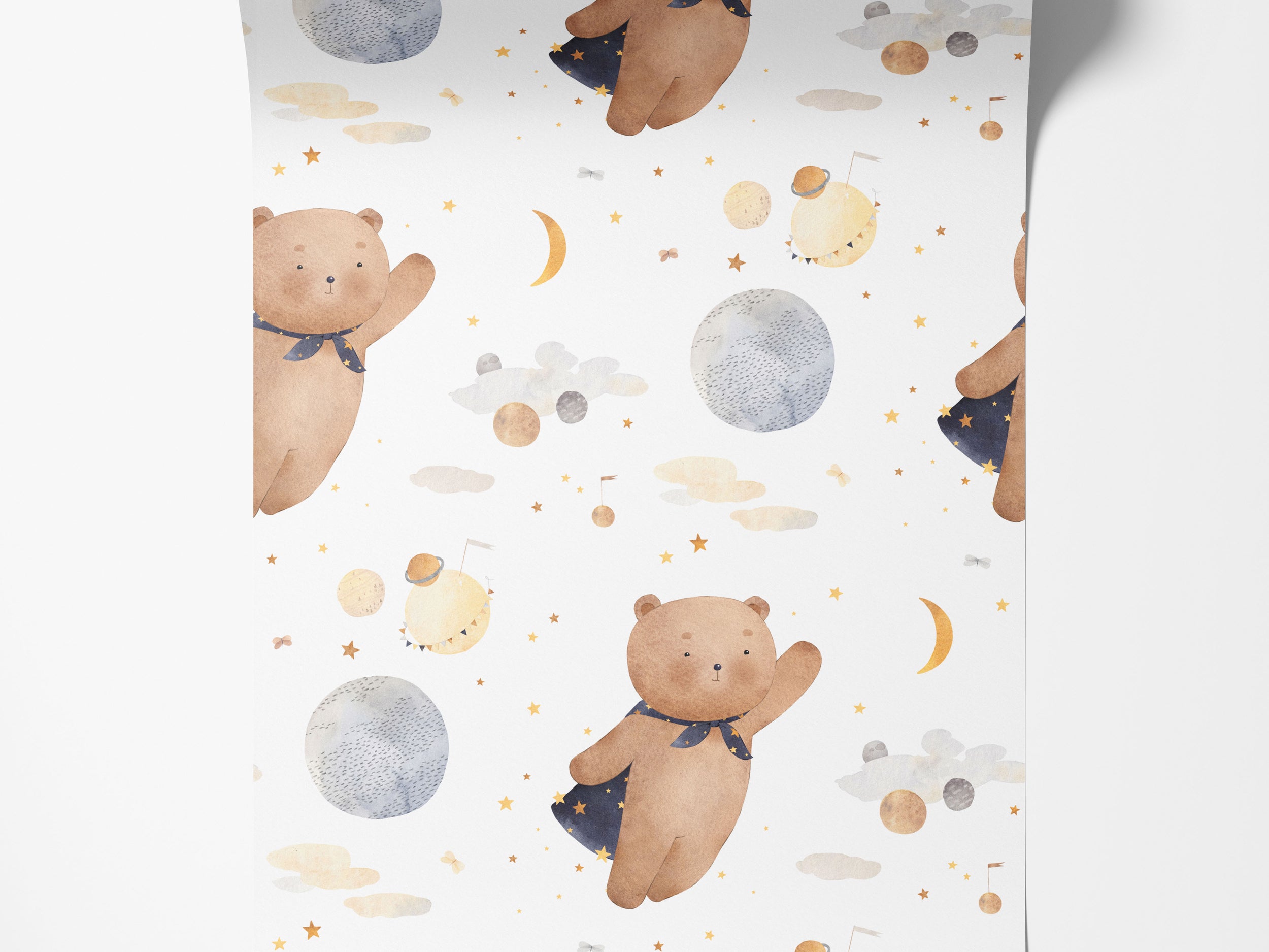 Watercolor wallpaper with brown teddy bears, some with blue capes, amidst grey and yellow planets, moons, clouds, and stars.