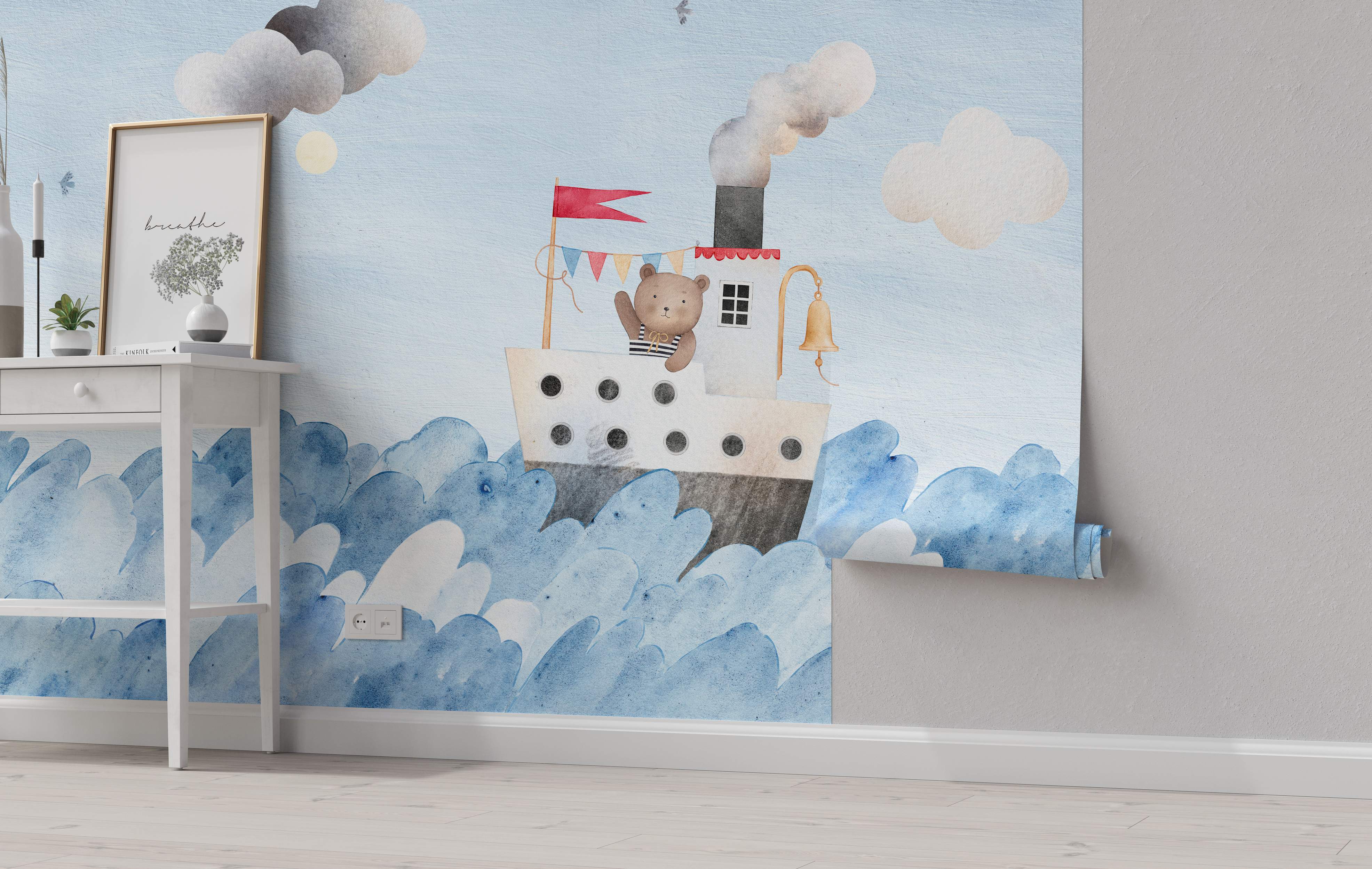 Watercolor mural featuring a cartoon bear on a steamboat sailing on stylized blue waves under a pale blue sky with clouds.