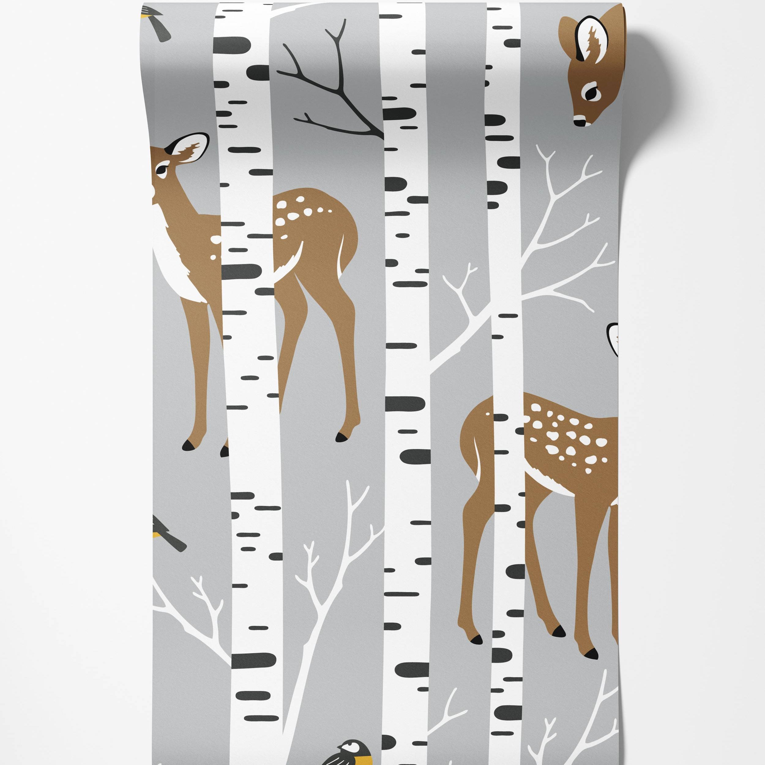 A woodland wallpaper with stylized birch trees, brown deer, and yellow birds on a soft gray background.