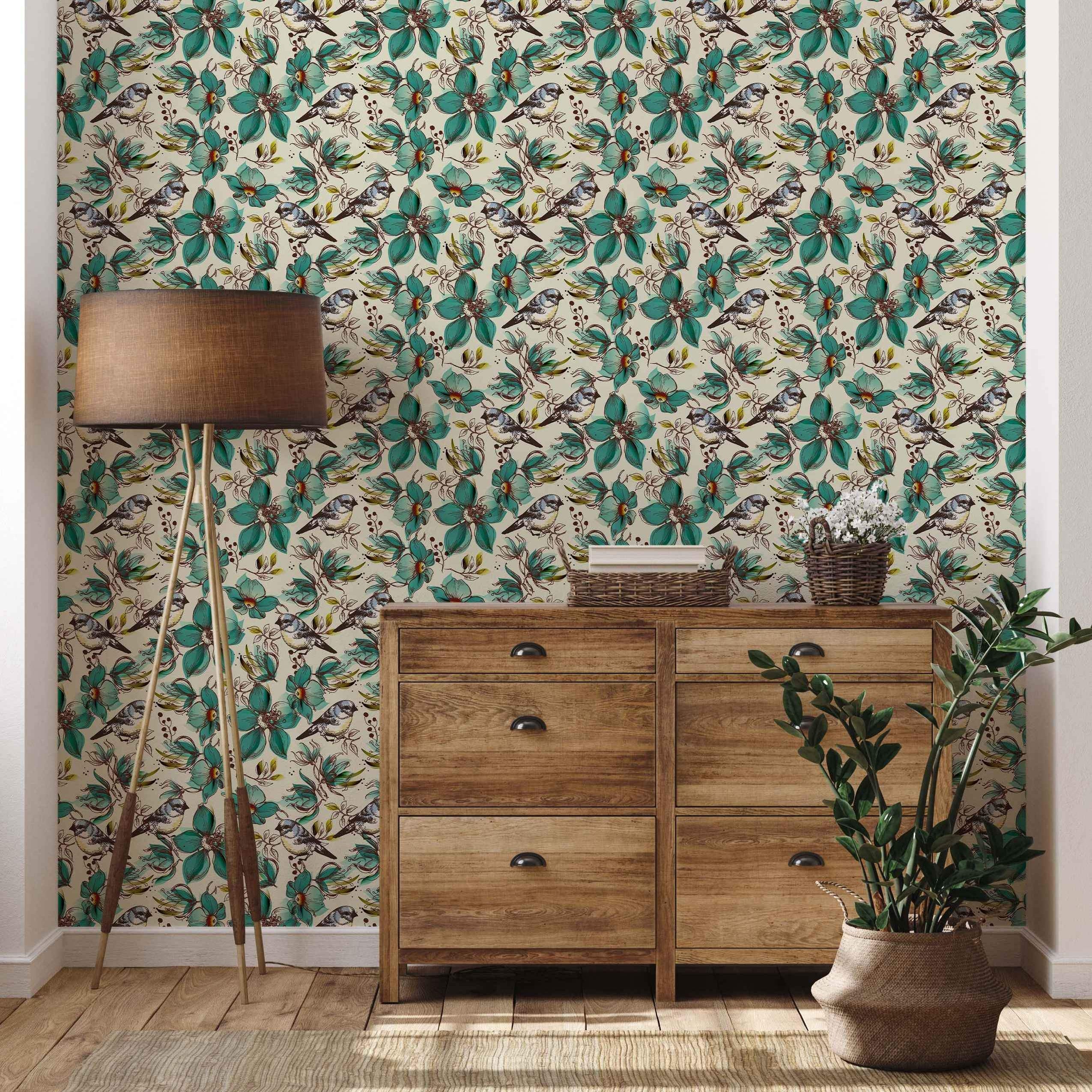 Wallpaper featuring illustrated blue tit birds perched among large teal flowers and sketched foliage on a cream background.