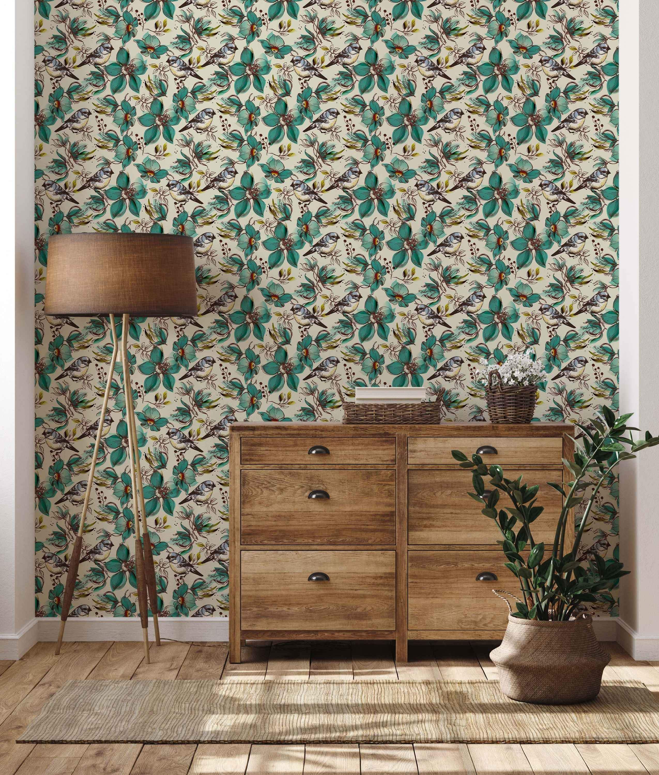 Wallpaper featuring illustrated blue tit birds perched among large teal flowers and sketched foliage on a cream background.