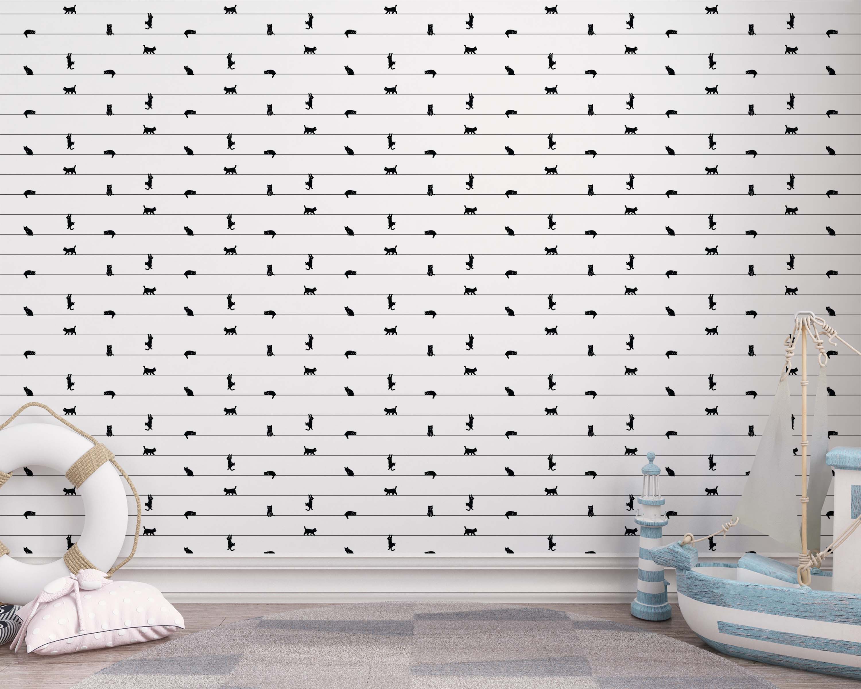 Wallpaper with a pattern of black cat silhouettes in various poses on thin horizontal lines against a white background.