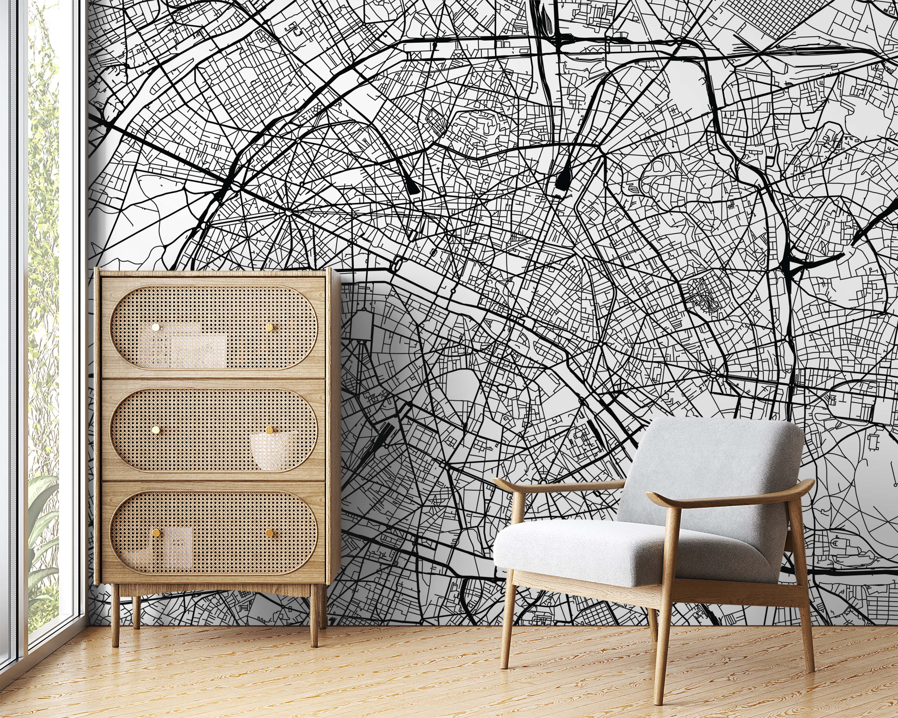 A detailed black and white city map mural, featuring intricate street layouts and urban patterns, covers the wall.