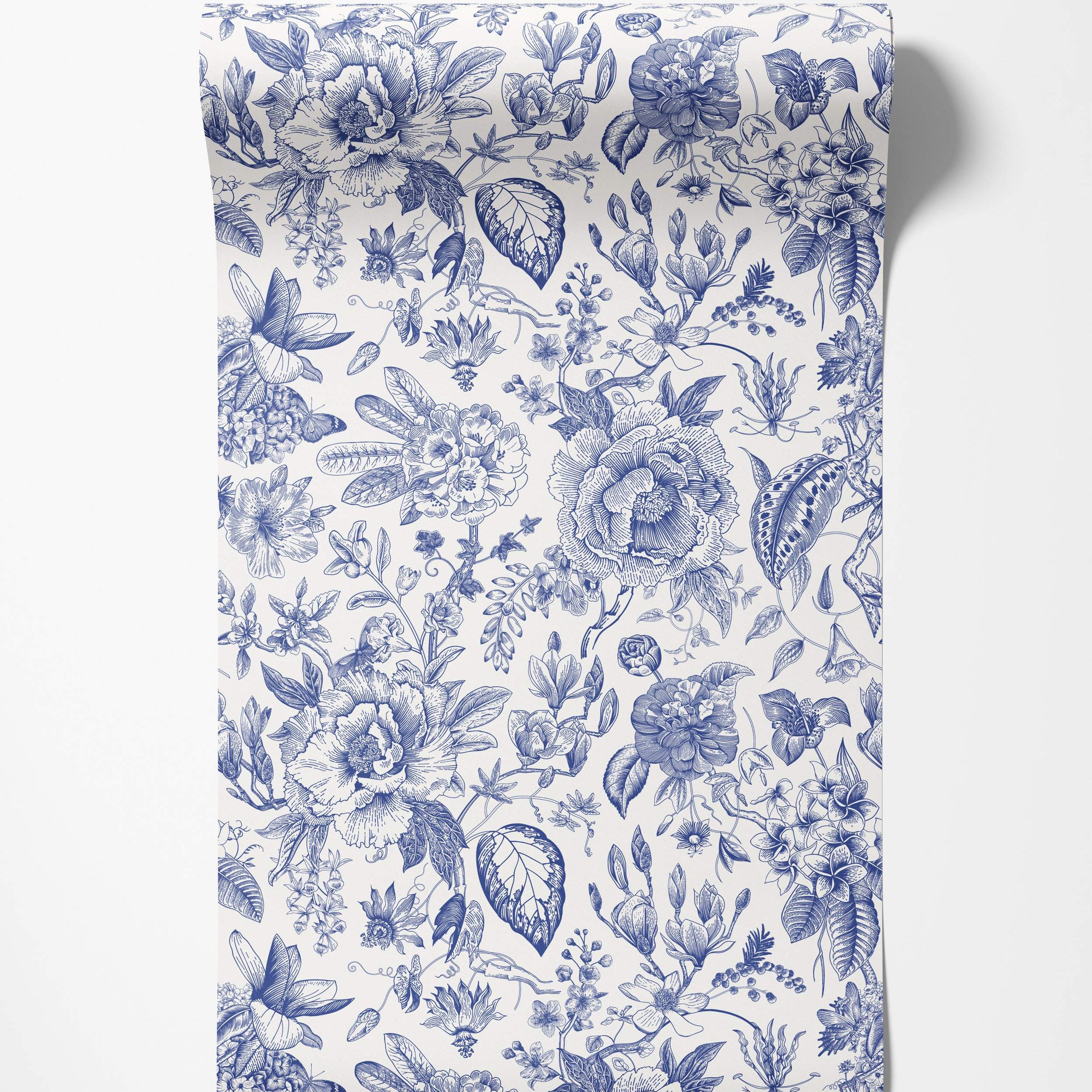 A classic wallpaper with an intricate blue and white floral toile pattern featuring flowers, butterflies, and leaves.