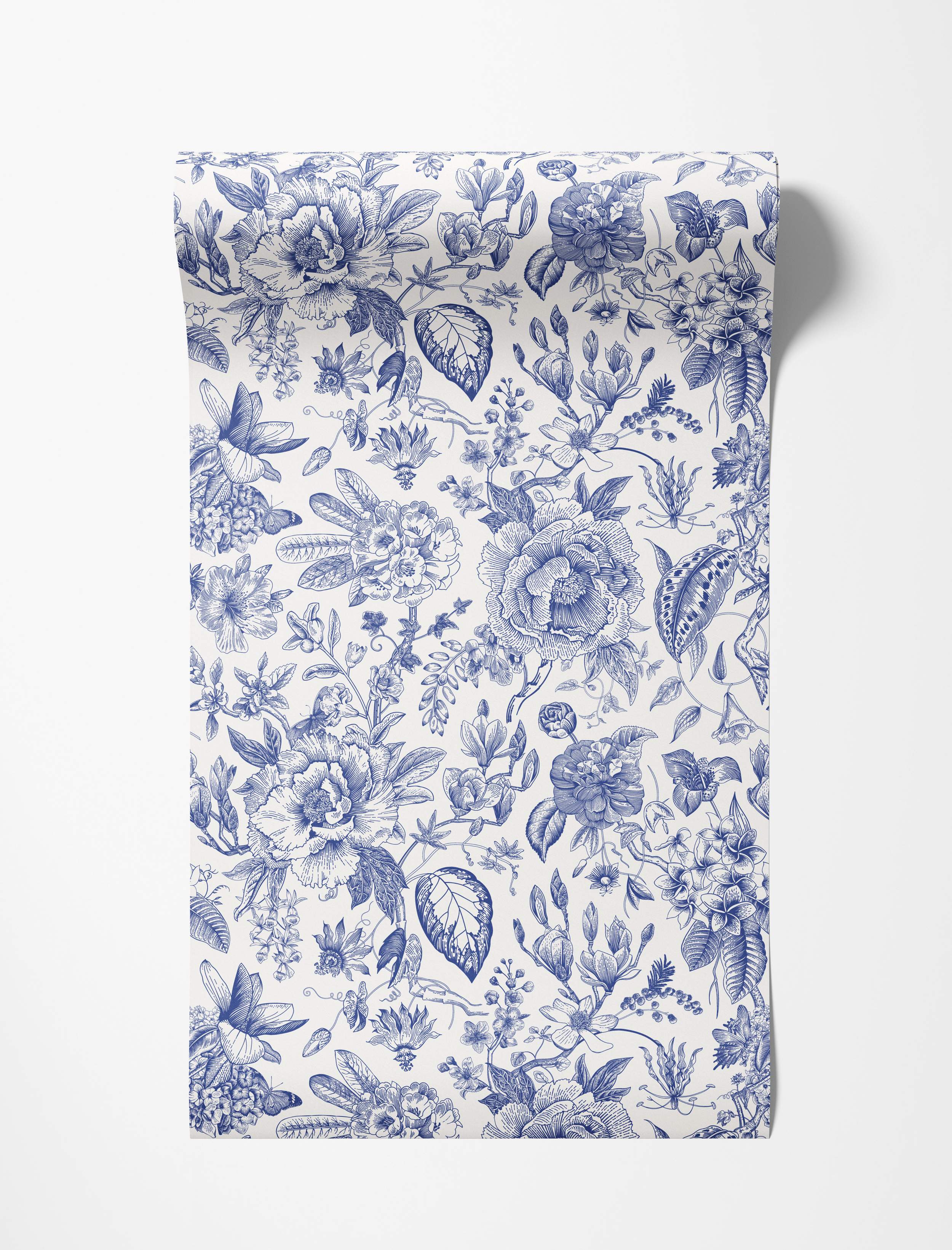 A classic wallpaper with an intricate blue and white floral toile pattern featuring flowers, butterflies, and leaves.