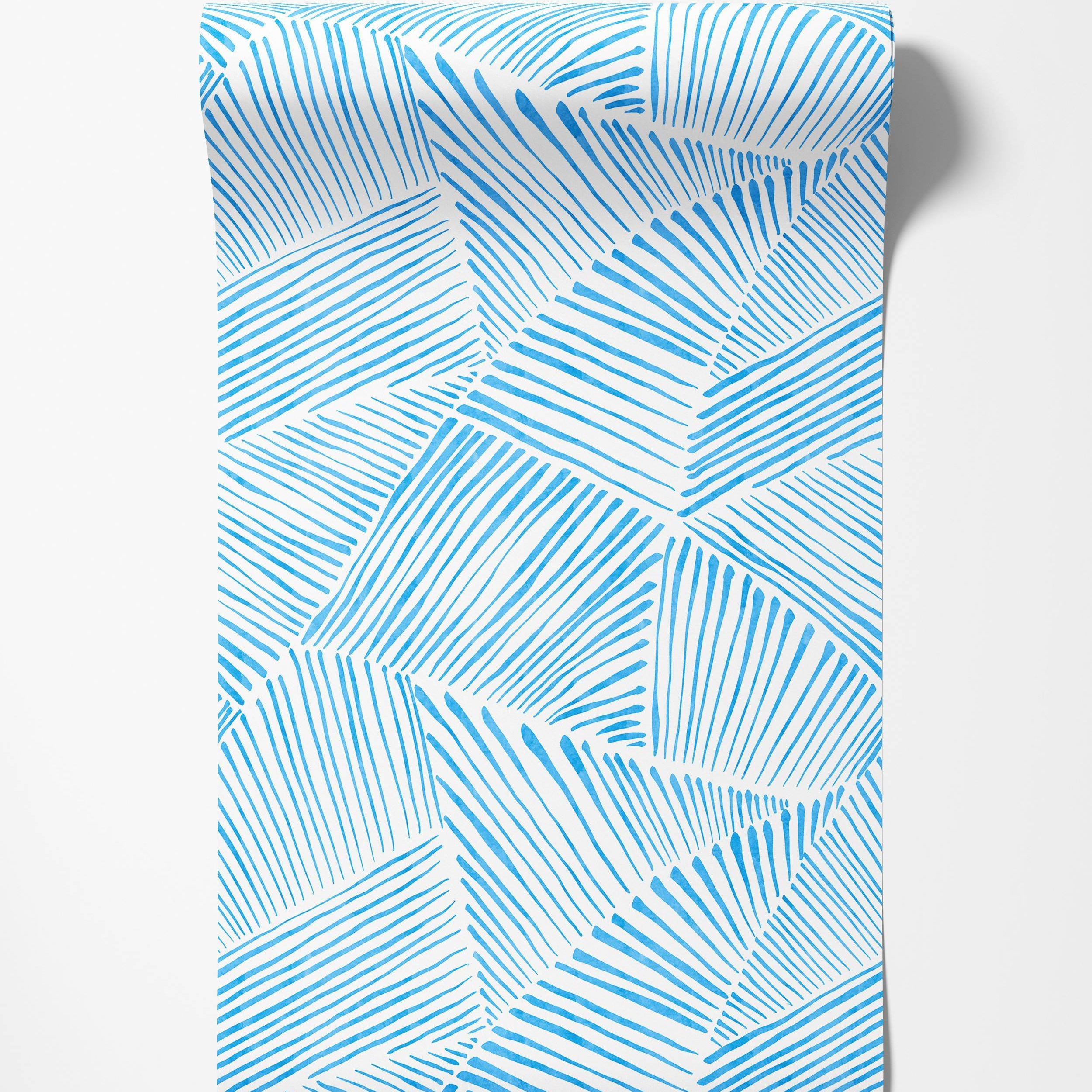 Wallpaper with a dynamic pattern of hand-drawn bright blue lines forming fan-like segments on a white background.